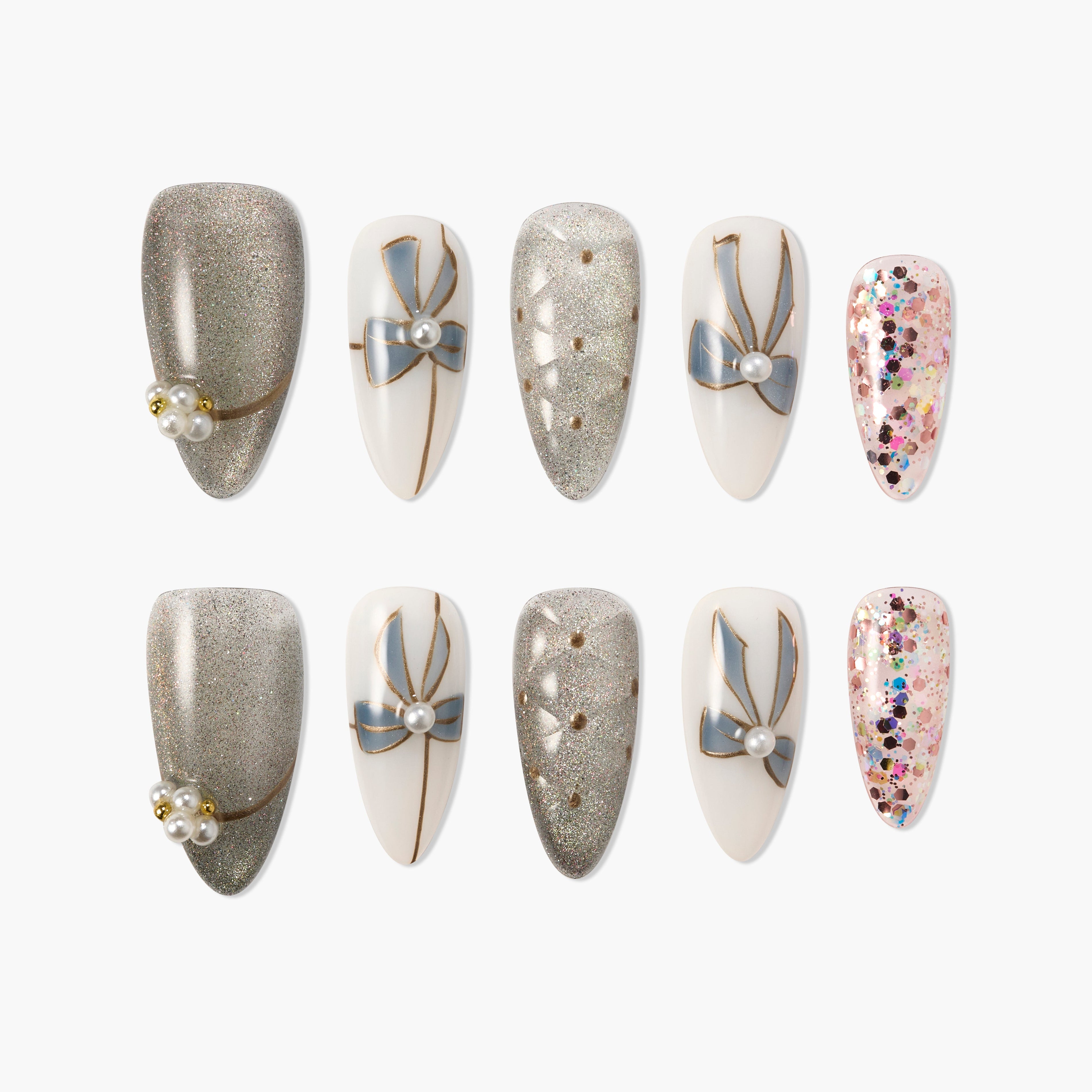 Handmade press-on nails with glitter, pearl accents, bows, and multicolor confetti design