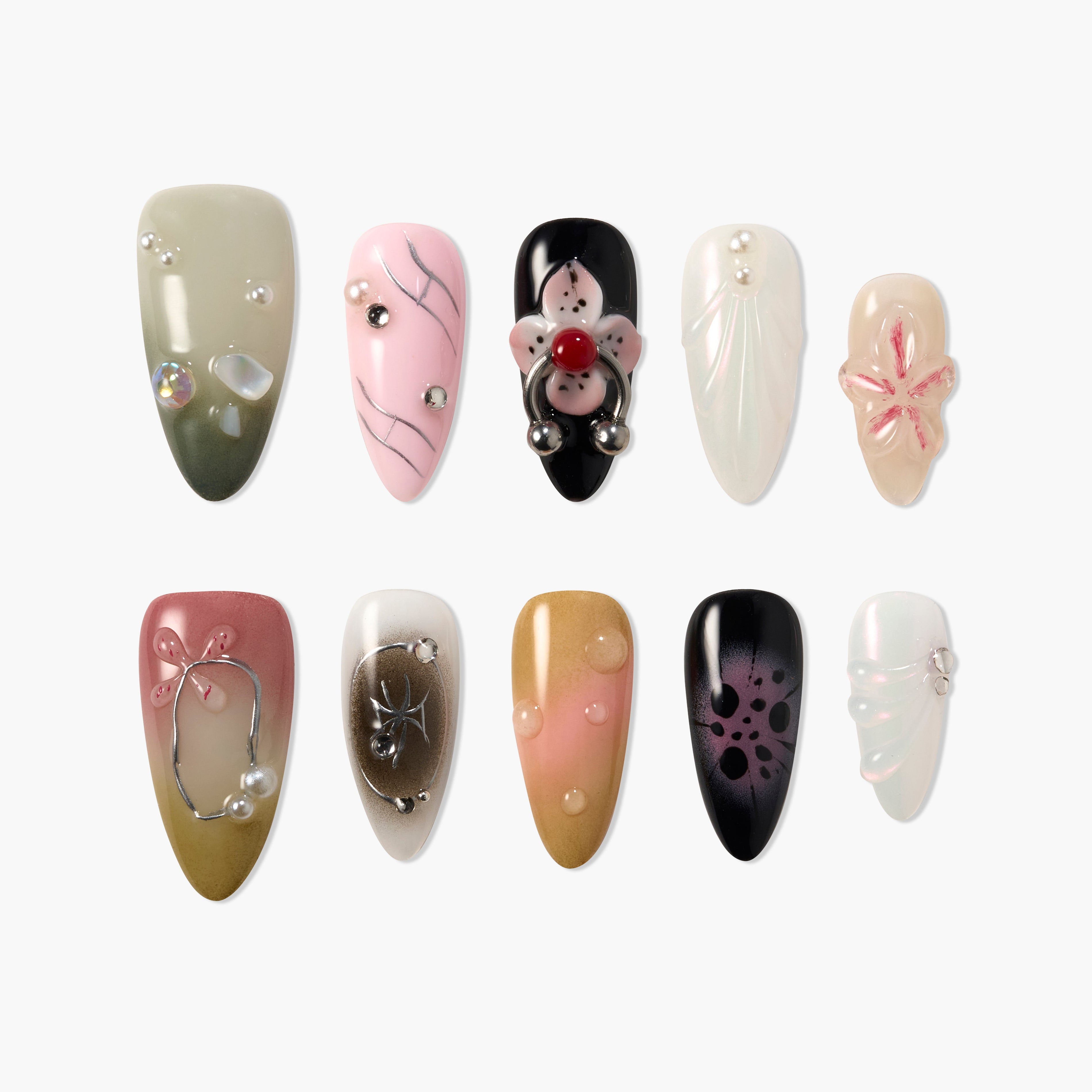 Set of handmade press-on nails with pearl, jewel, and floral designs in various colors