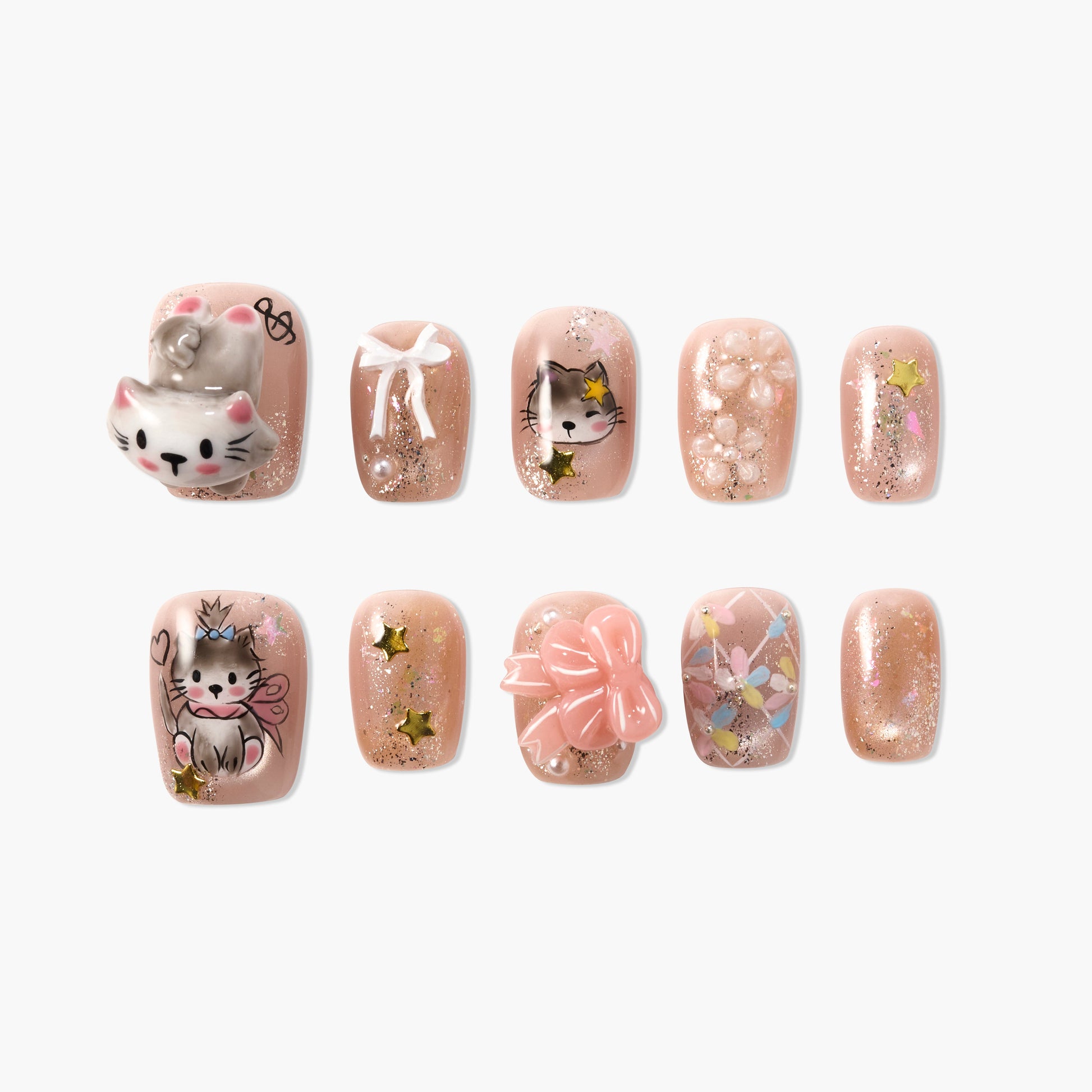 Cute handmade press-on nails with cat, bow, star, and floral designs on pink glitter base.