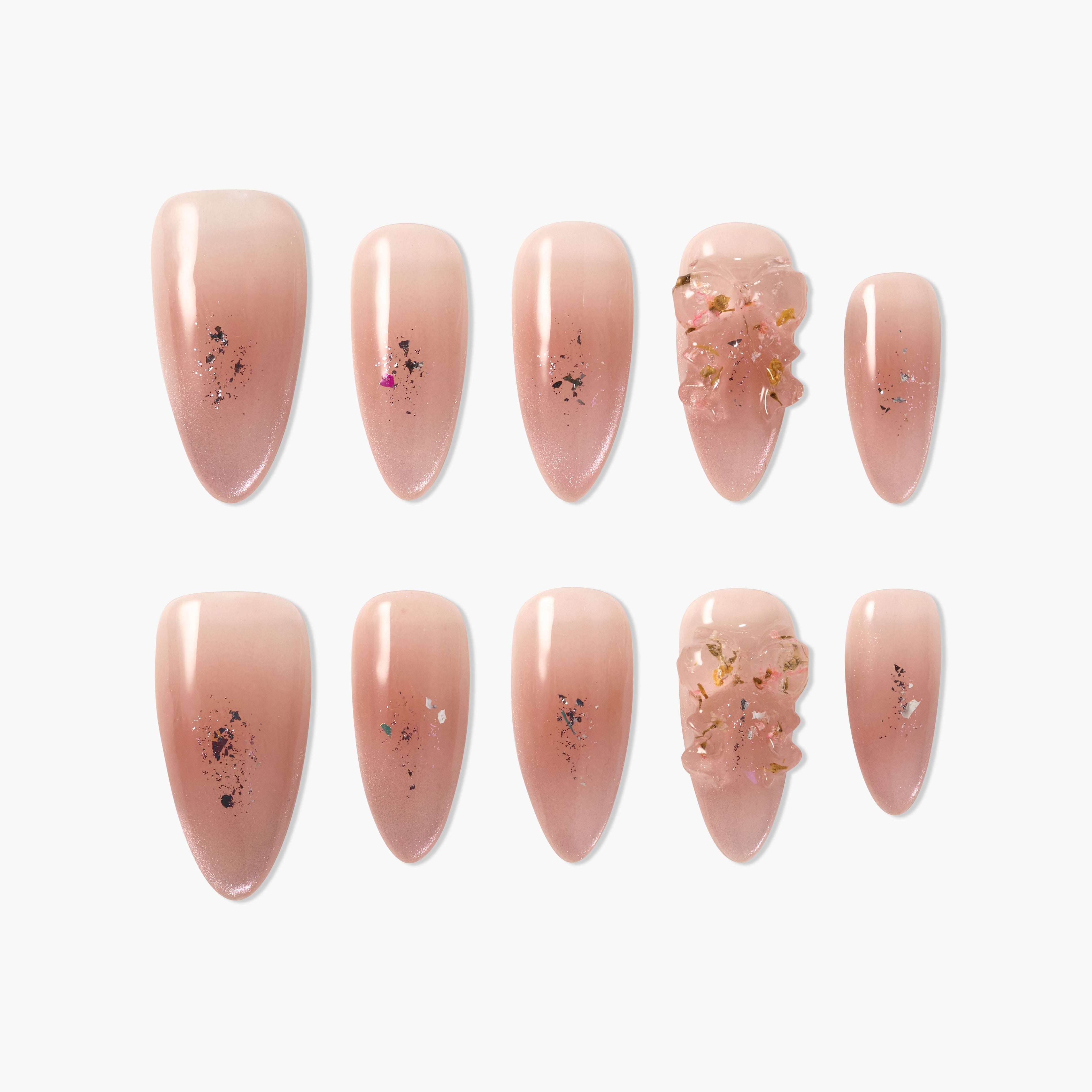 Handmade nude pink press-on nails with glitter and 3D floral accents, almond shape