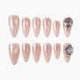 Glossy nude press-on nails set with clear gemstone accent, oval shape, elegant nail design