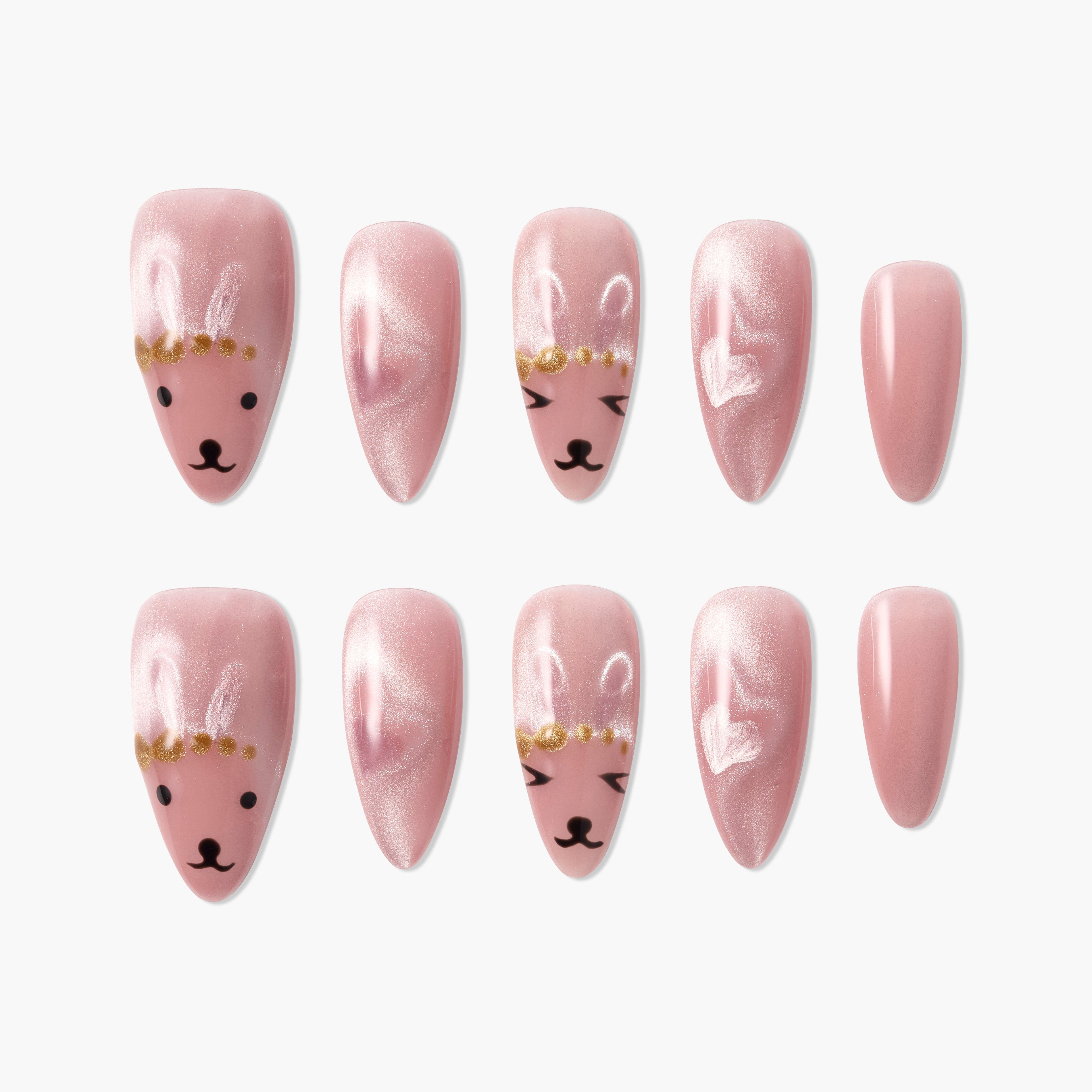Pink press-on nails with cute bunny faces and gold accents, glossy finish, playful nail art