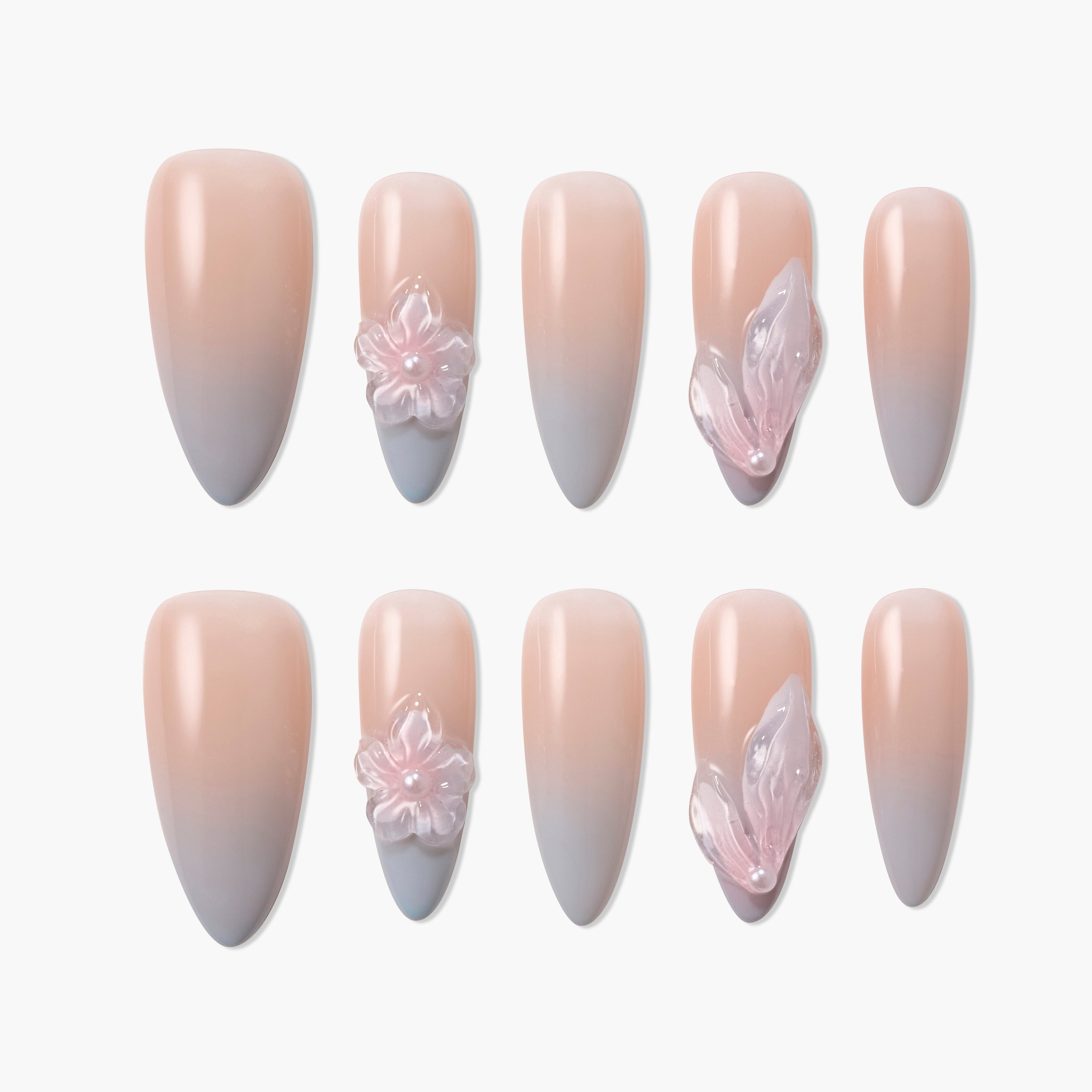 Handmade press-on nails with nude to grey ombre and 3D floral designs, glossy finish