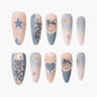 Handmade press-on nails with denim texture, stars, bows, laces, and heart accents.
