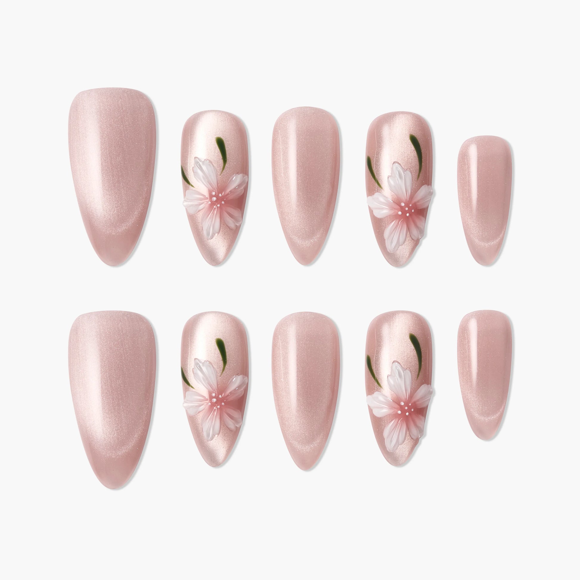 Glossy pink handmade press-on nails with 3D white floral and green leaf accents
