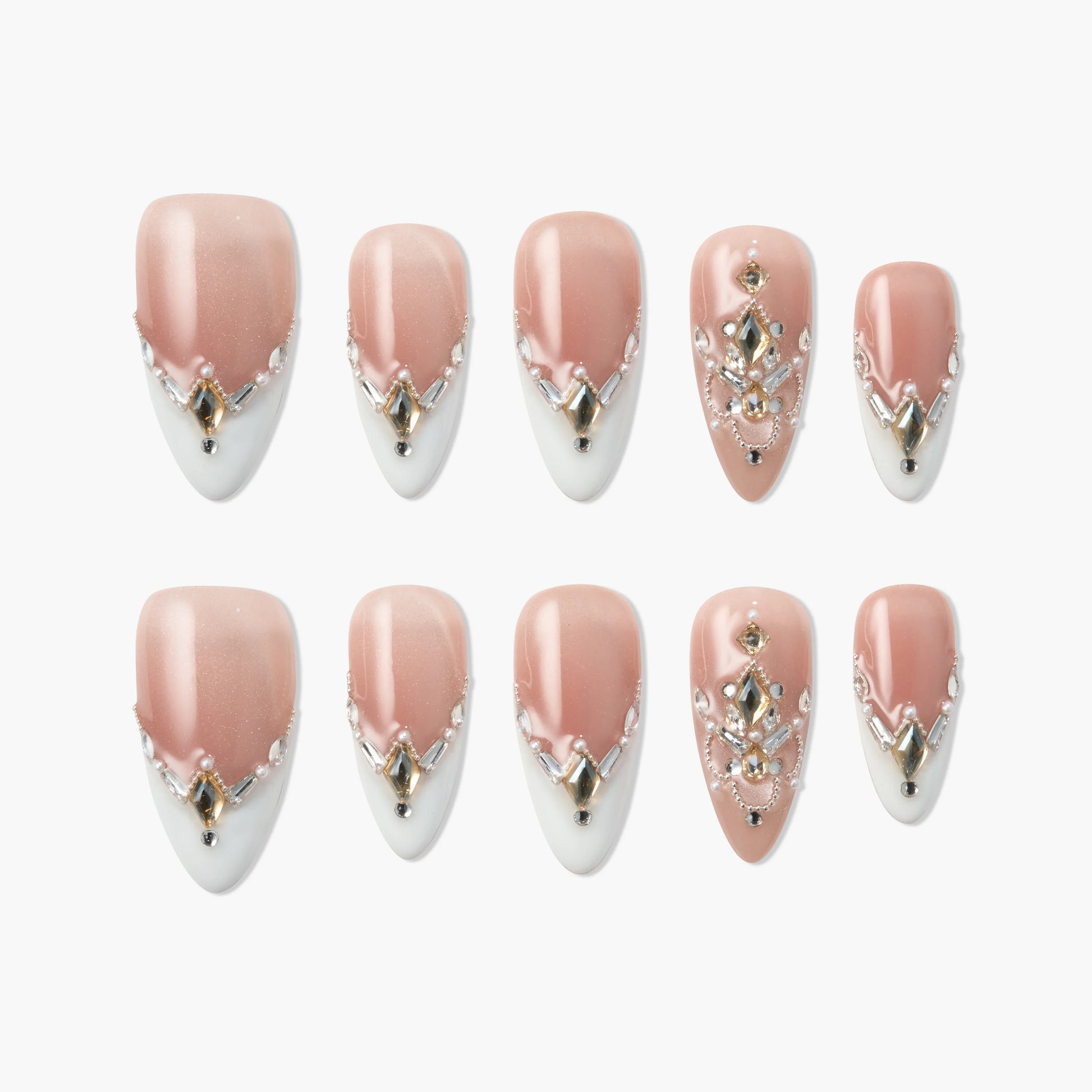 Handmade press-on nails in pink and white French tip design with jeweled accents