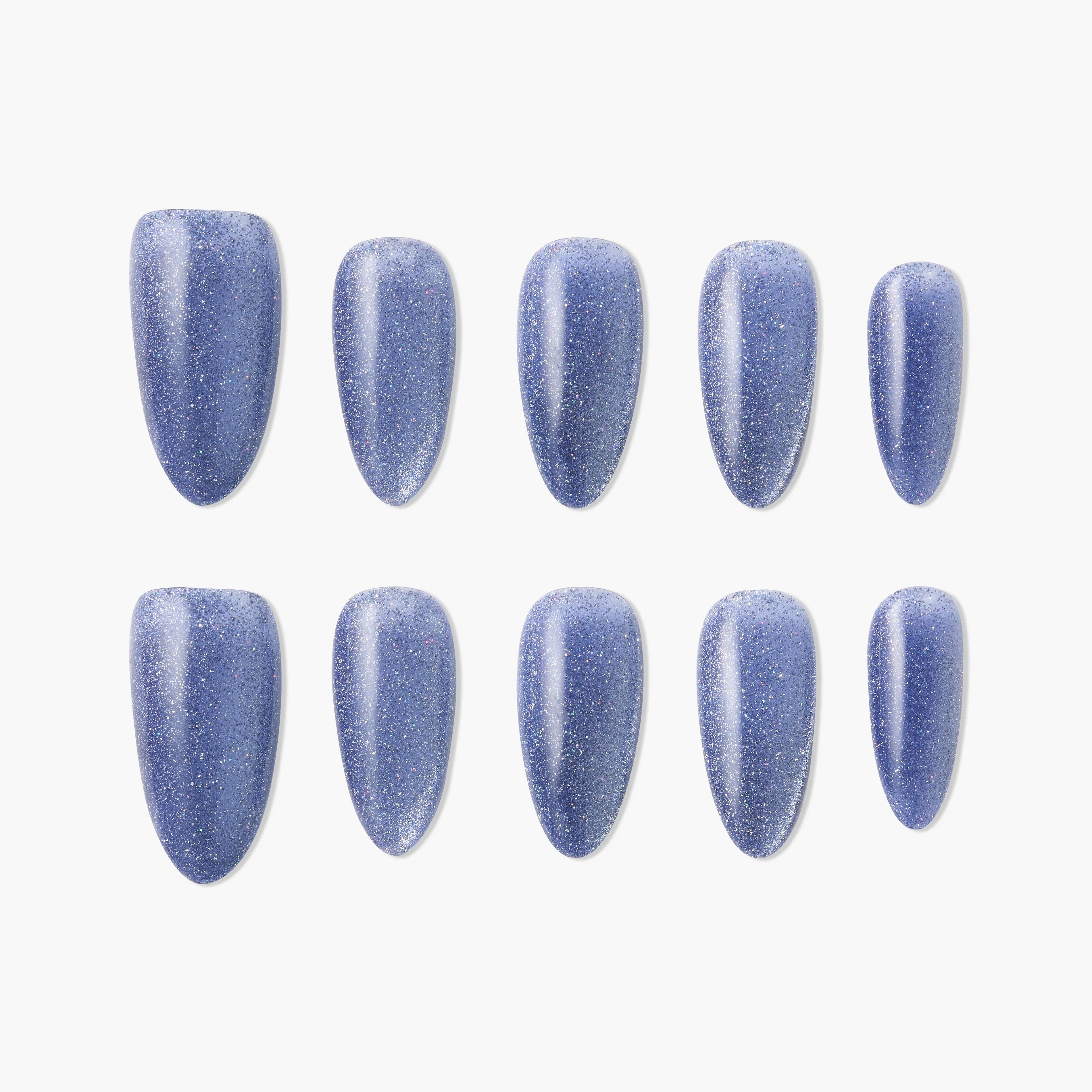 Set of oval blue glitter press-on nails arranged on a white background