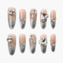 Ombre silver and nude press-on nails with rhinestone and crystal gem accents