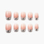 Set of pink ombre press-on nails with silver glitter and gem accents, arranged on white background