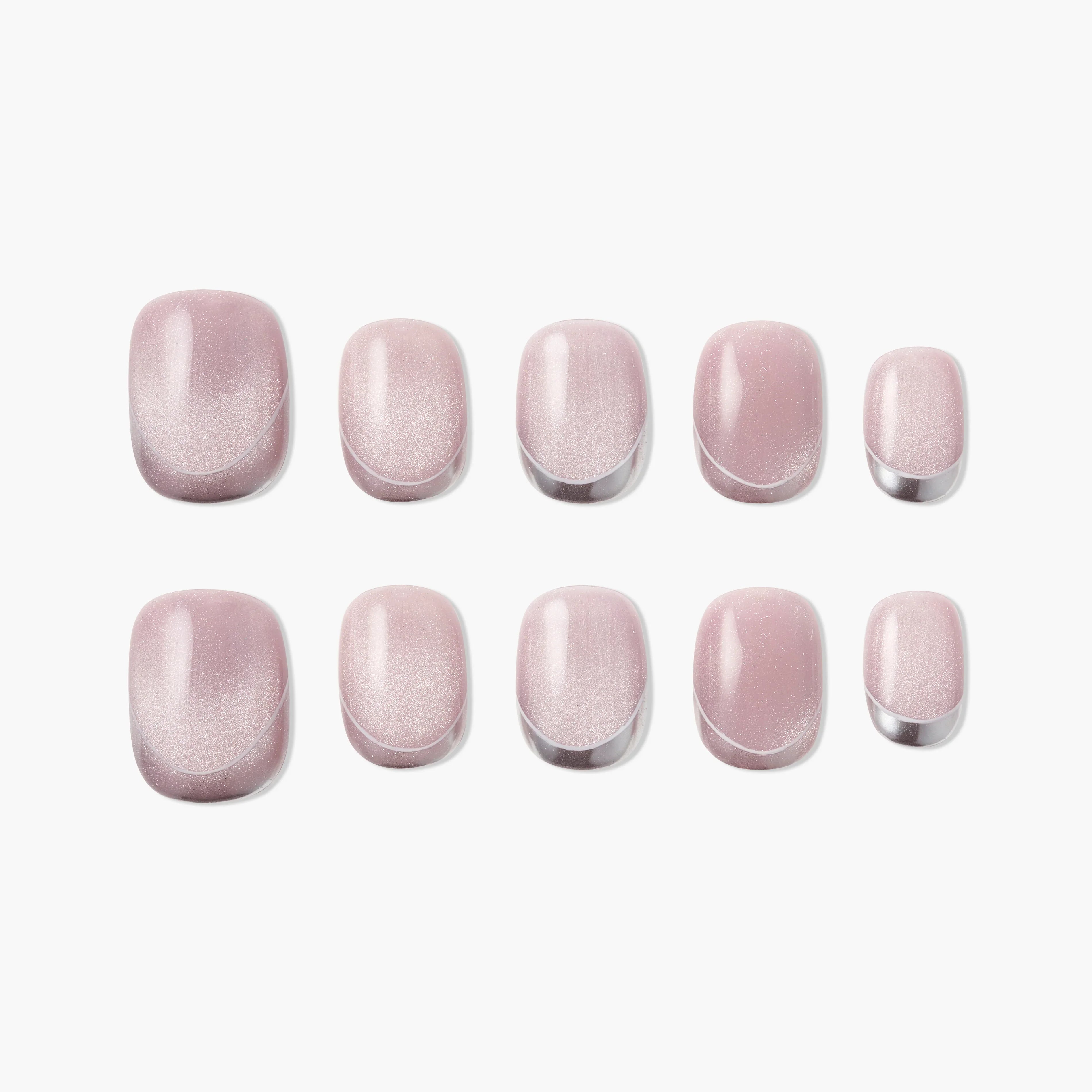 Set of glossy pink handmade press-on nails with subtle shimmer and curved accent tips