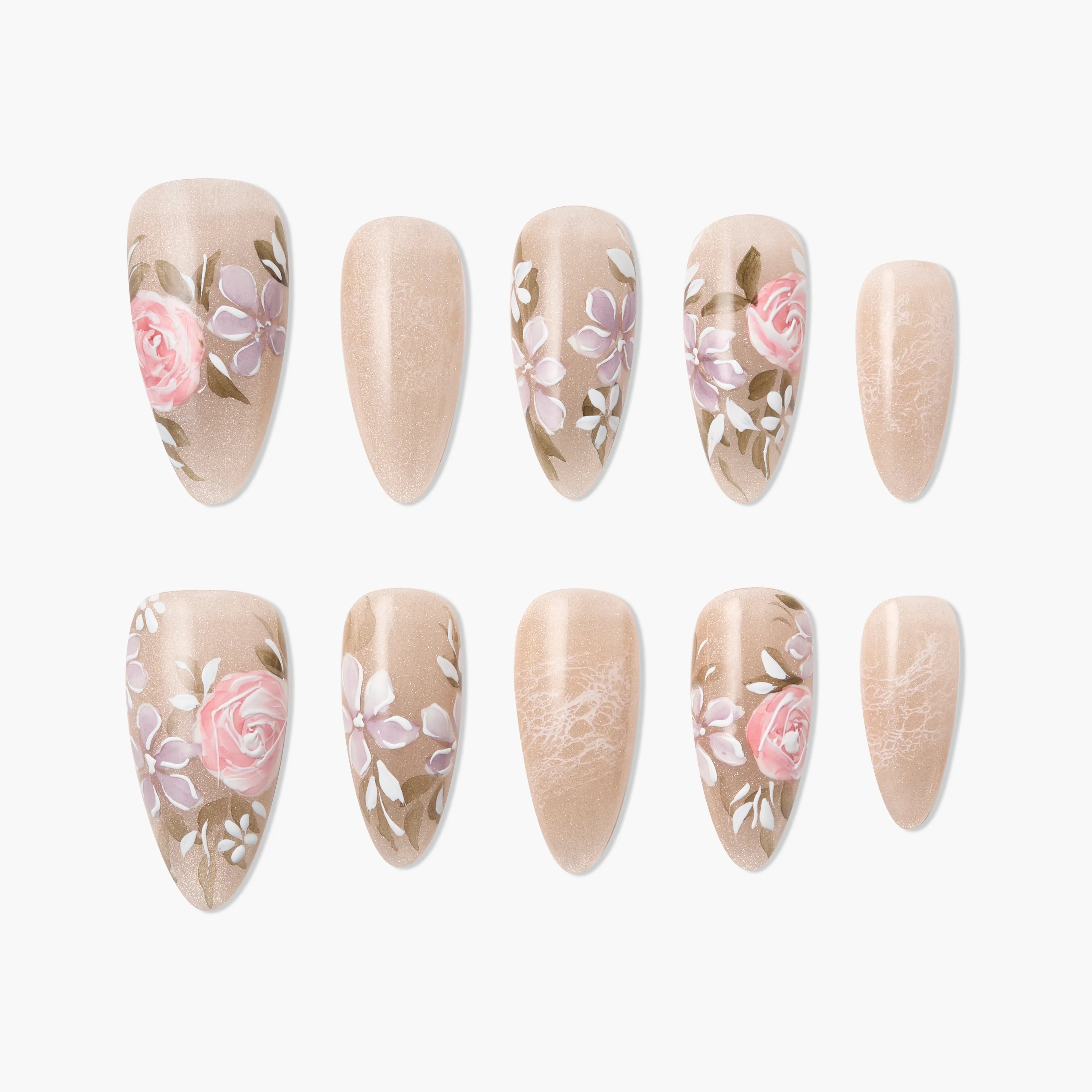 Handmade press-on nails with nude base and pink floral designs, arranged on white background.