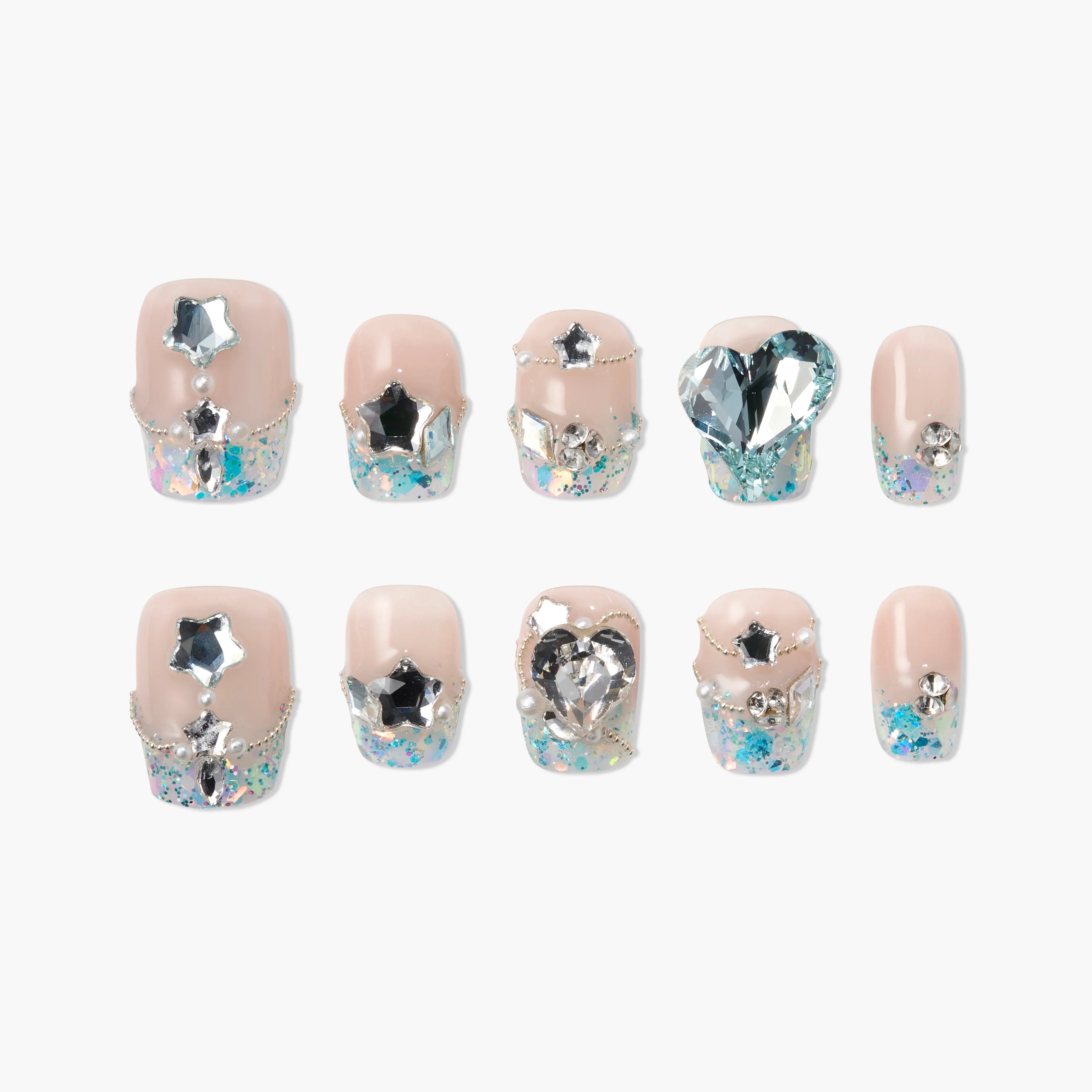 Handmade press-on nails with nude base, blue glitter, silver gems, heart and star accents