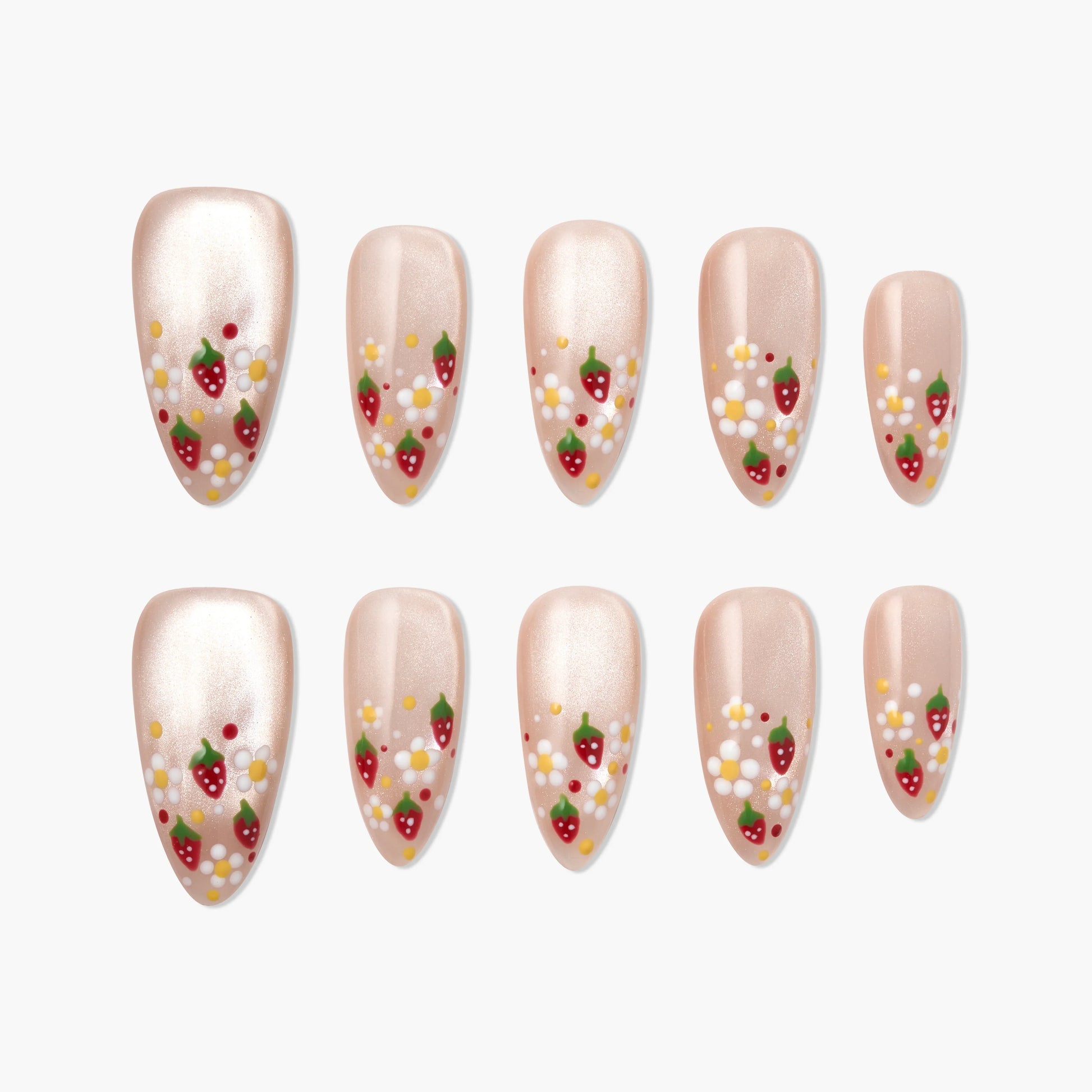 Handmade press-on nails with nude base, strawberry and flower nail art design, arranged on white background