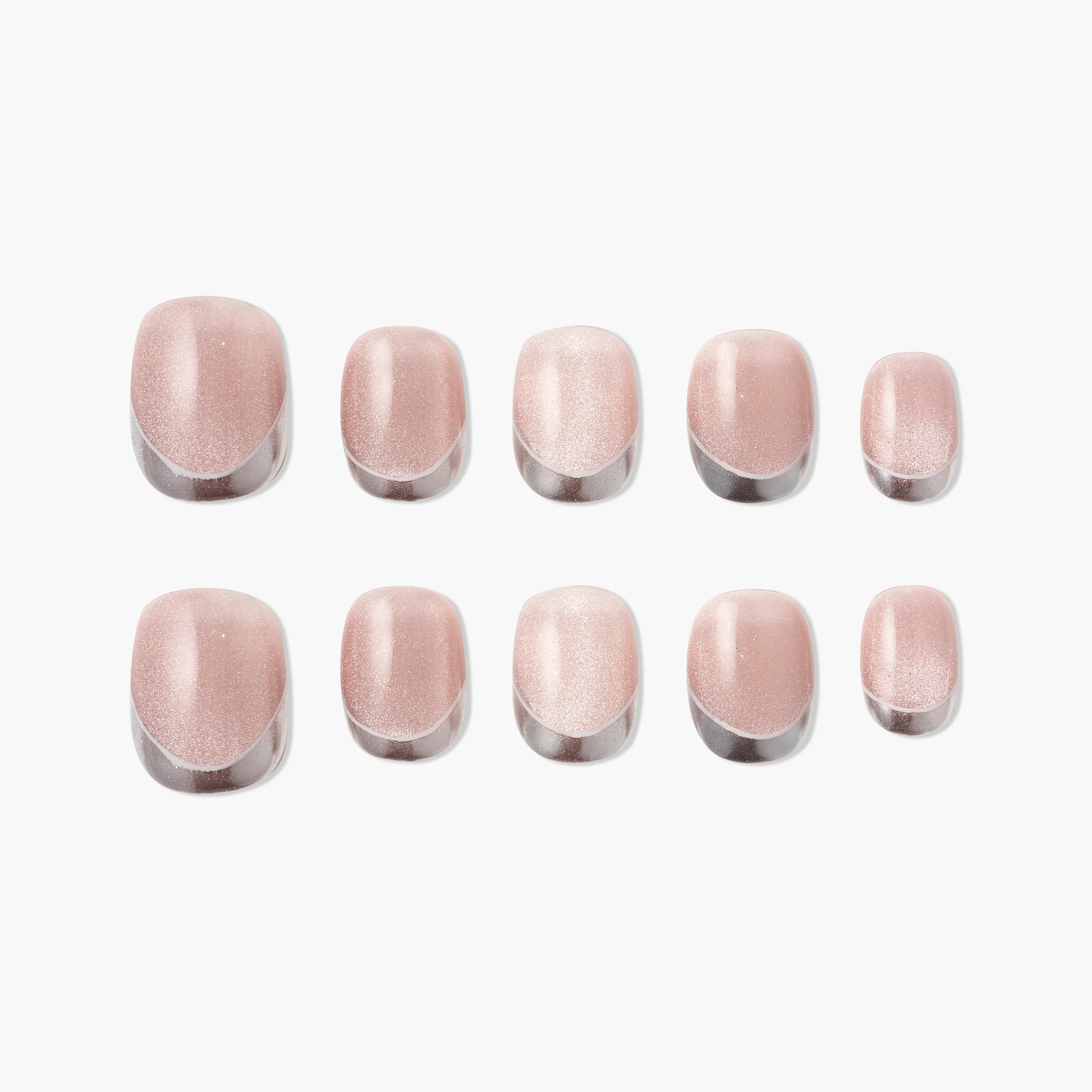 Set of glossy nude pink press-on nails with a subtle shimmer on a white background
