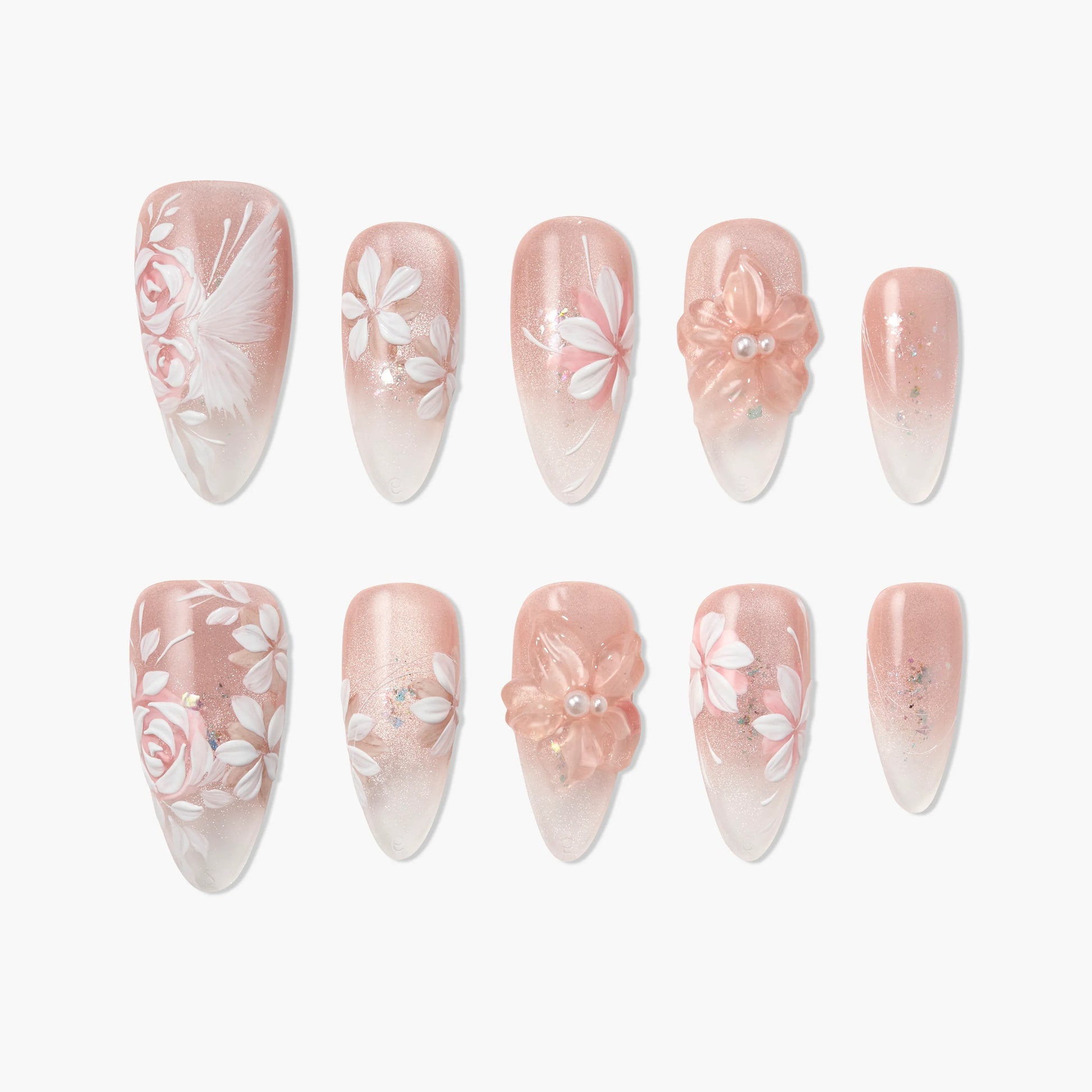 Pink floral press-on nails with 3D flower accents and delicate white painted designs