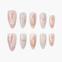 Handmade press-on nails with pink and white swan, floral, candle, bow, and butterfly designs