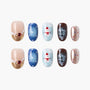 Christmas-themed press-on nails set with snowman, festive colors, and merry text designs