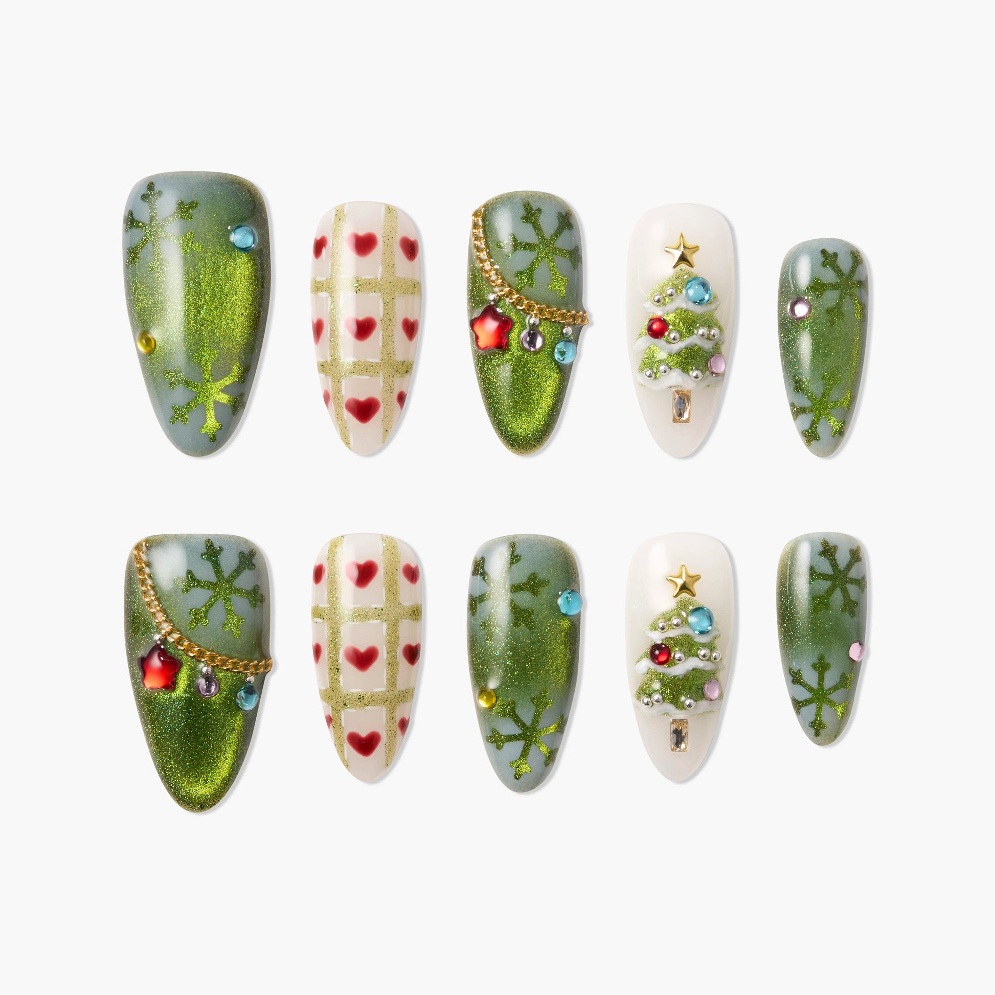 Christmas press-on nails with green glitter, snowflakes, hearts, and 3D tree decorations