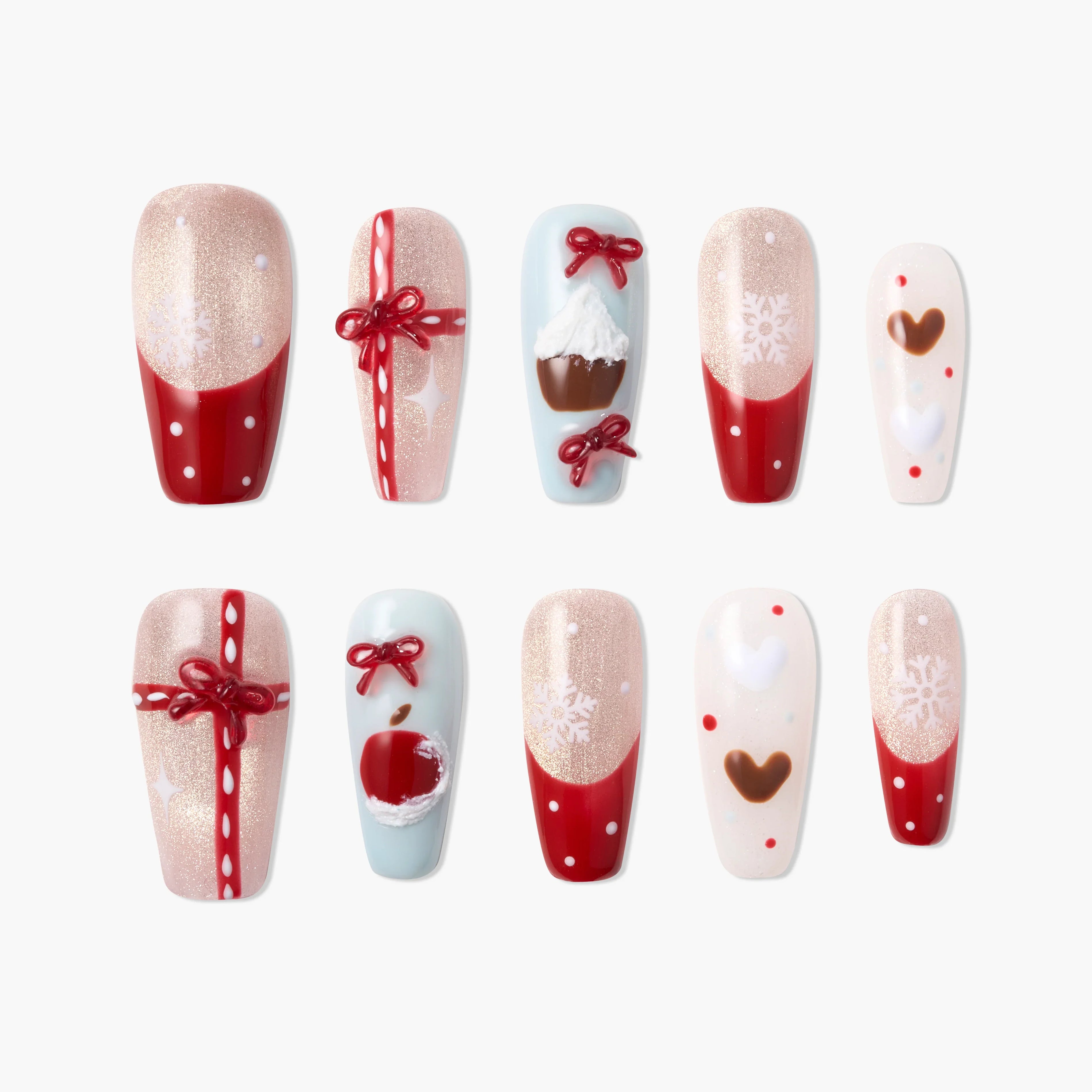 Christmas press-on nails set with red tips, bows, snowflake, heart, and holiday designs