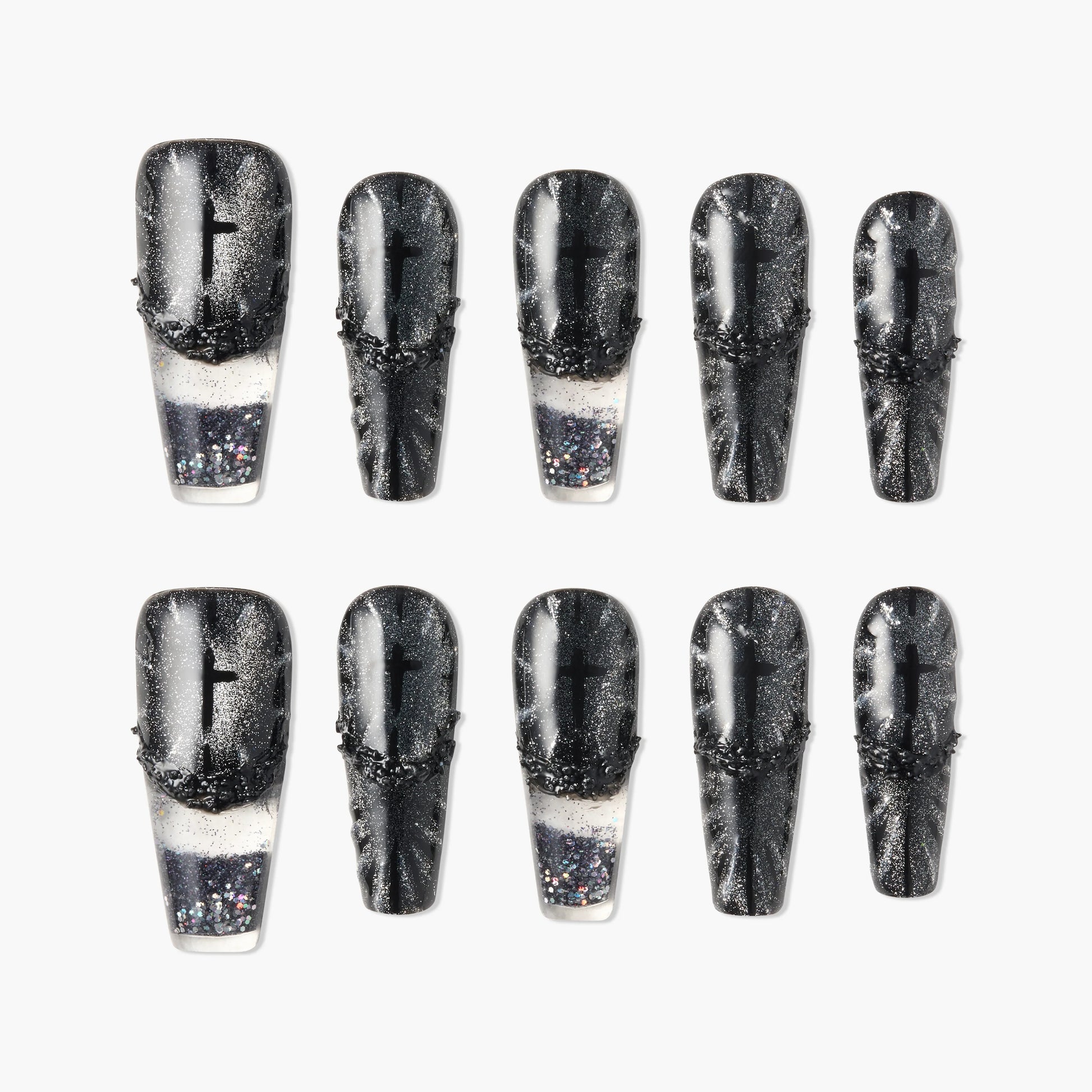 Set of black and silver glitter press-on nails with textured and ombre design on white background.