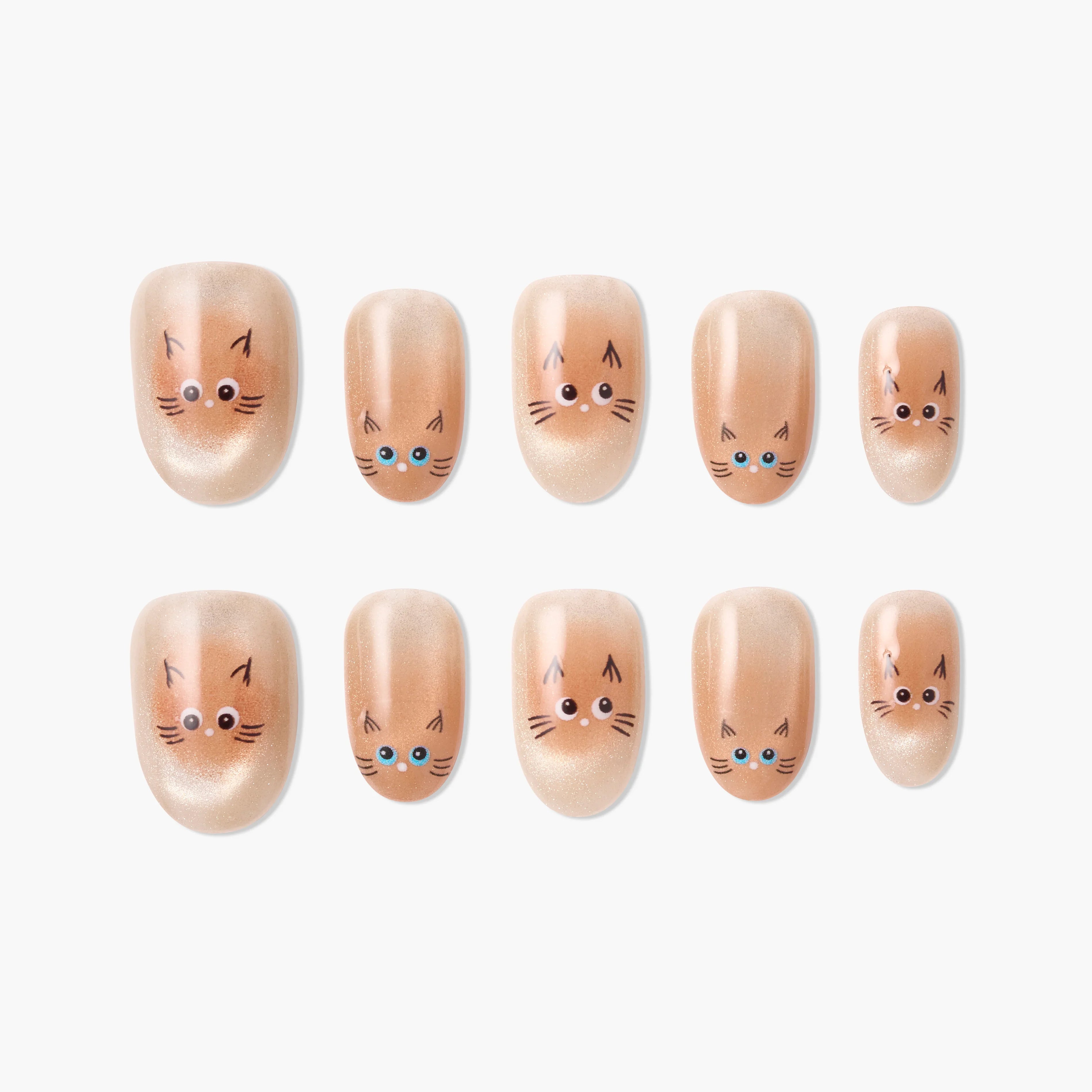 Cute cat face press-on nails with nude shimmer finish, reusable and salon-quality design.