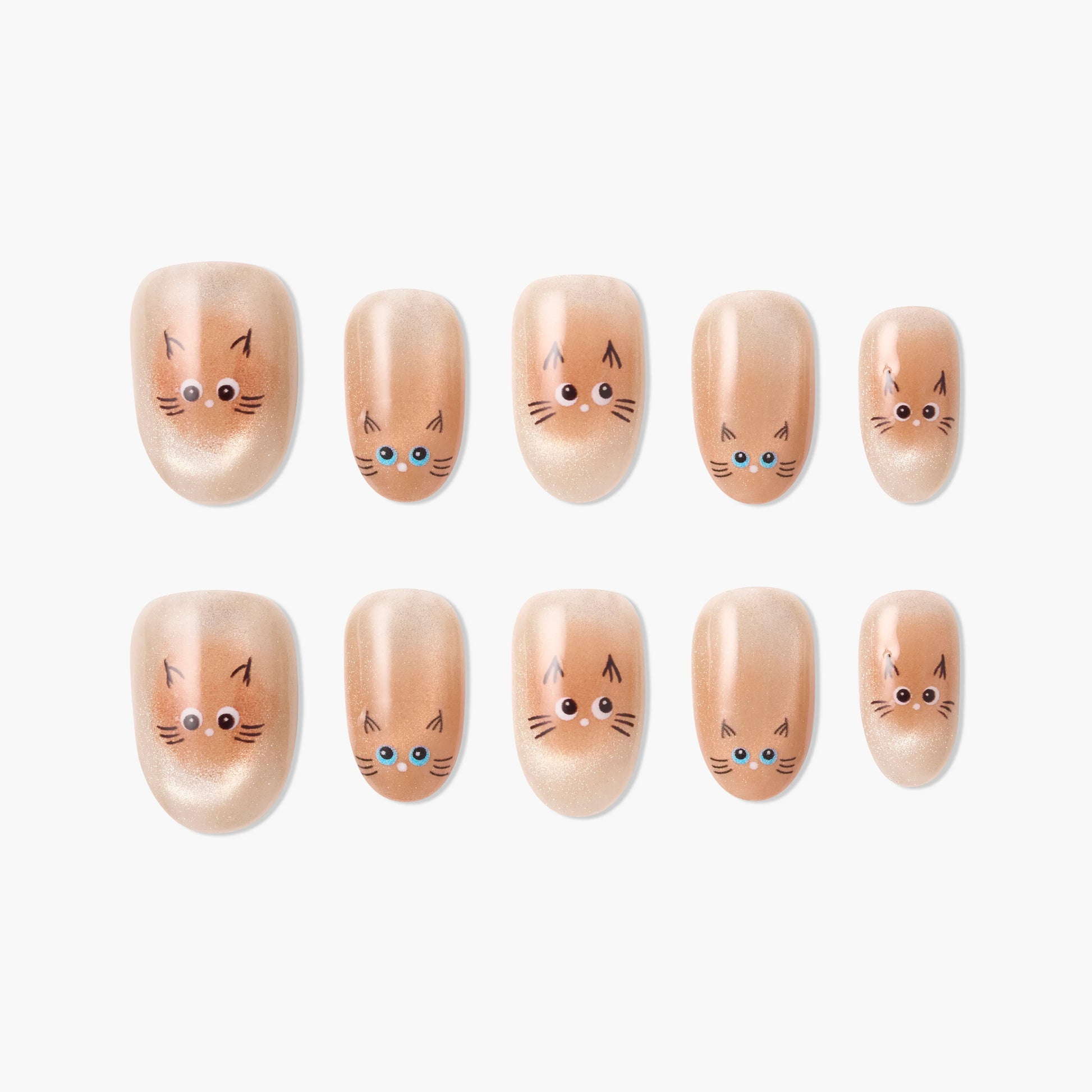 Cute cat face press-on nails with nude shimmer finish, reusable and salon-quality design.