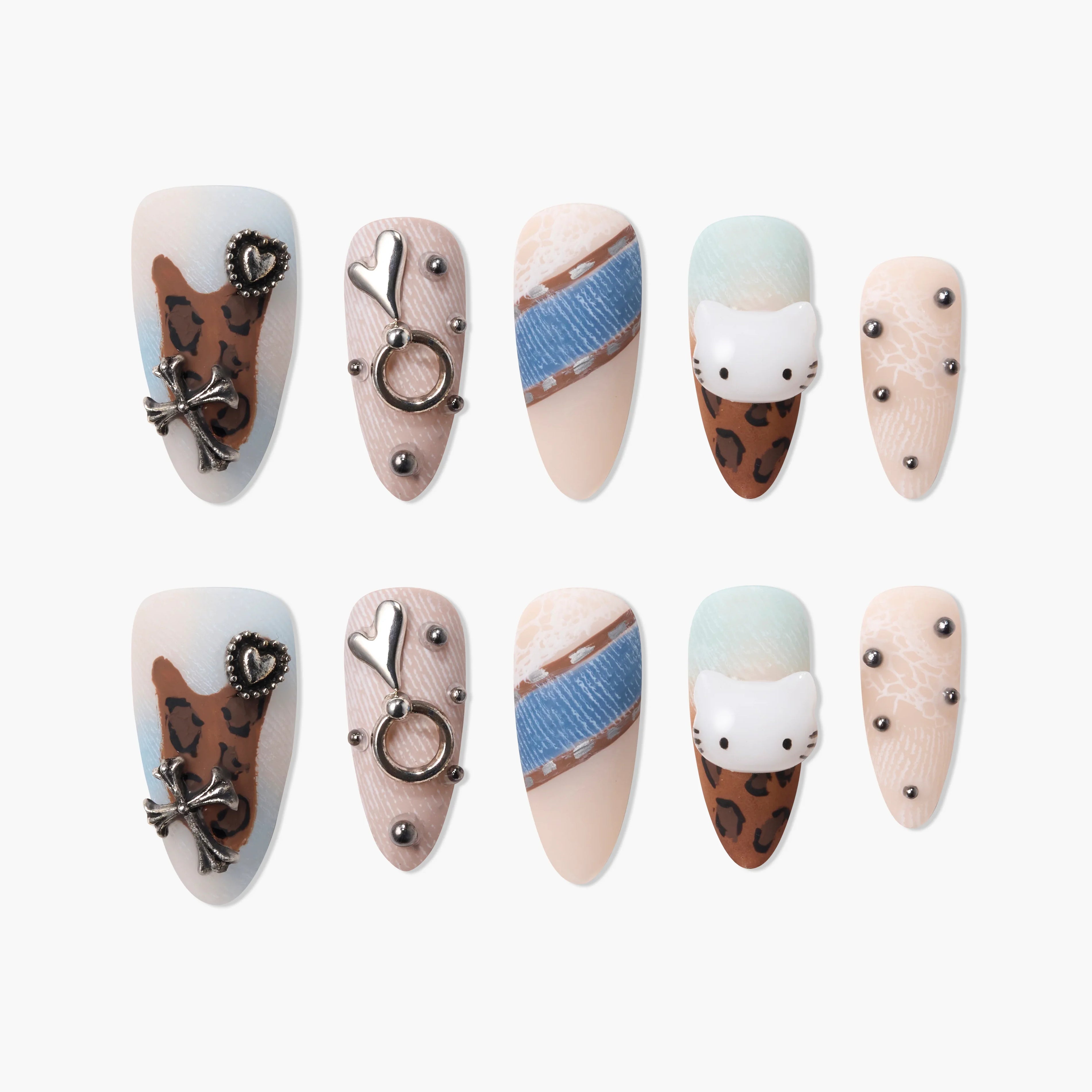 Handmade press-on nails with leopard print, metallic charms, denim accents, and cat face designs