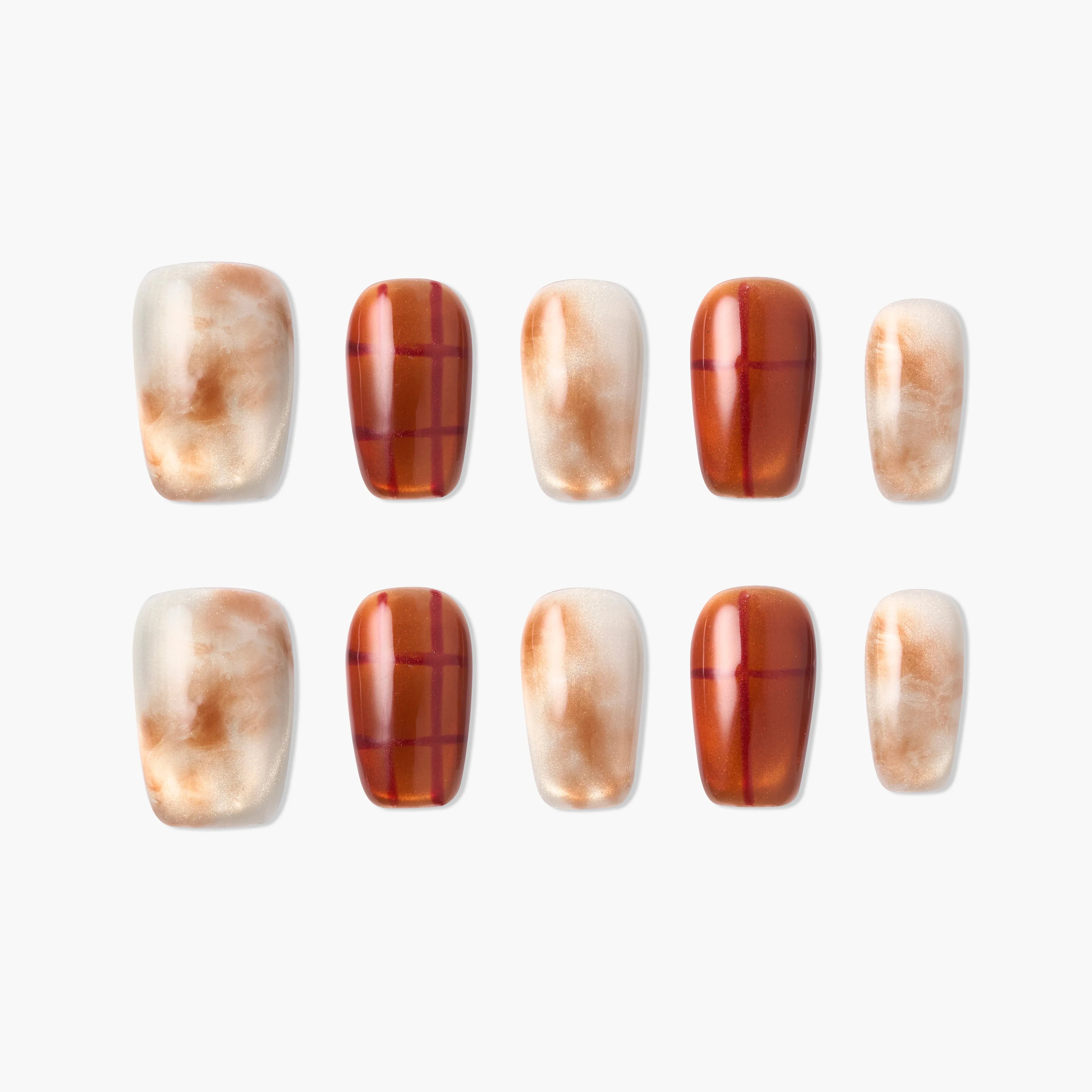 Handmade press-on nails set with marble and plaid designs in brown and beige tones, on white background.