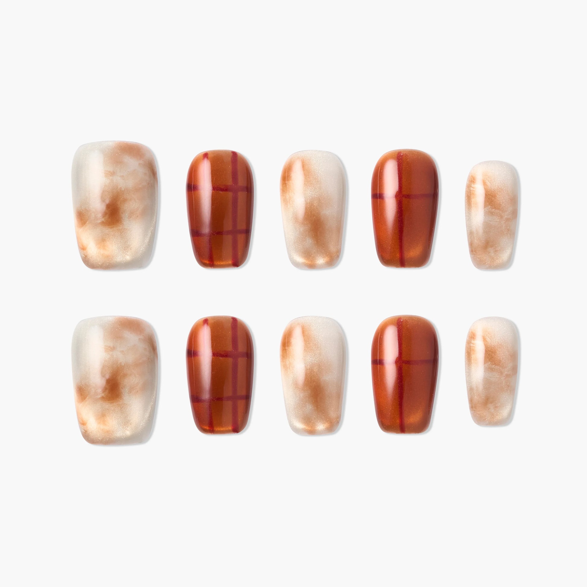 Handmade press-on nails set with marble and plaid designs in brown and beige tones, on white background.