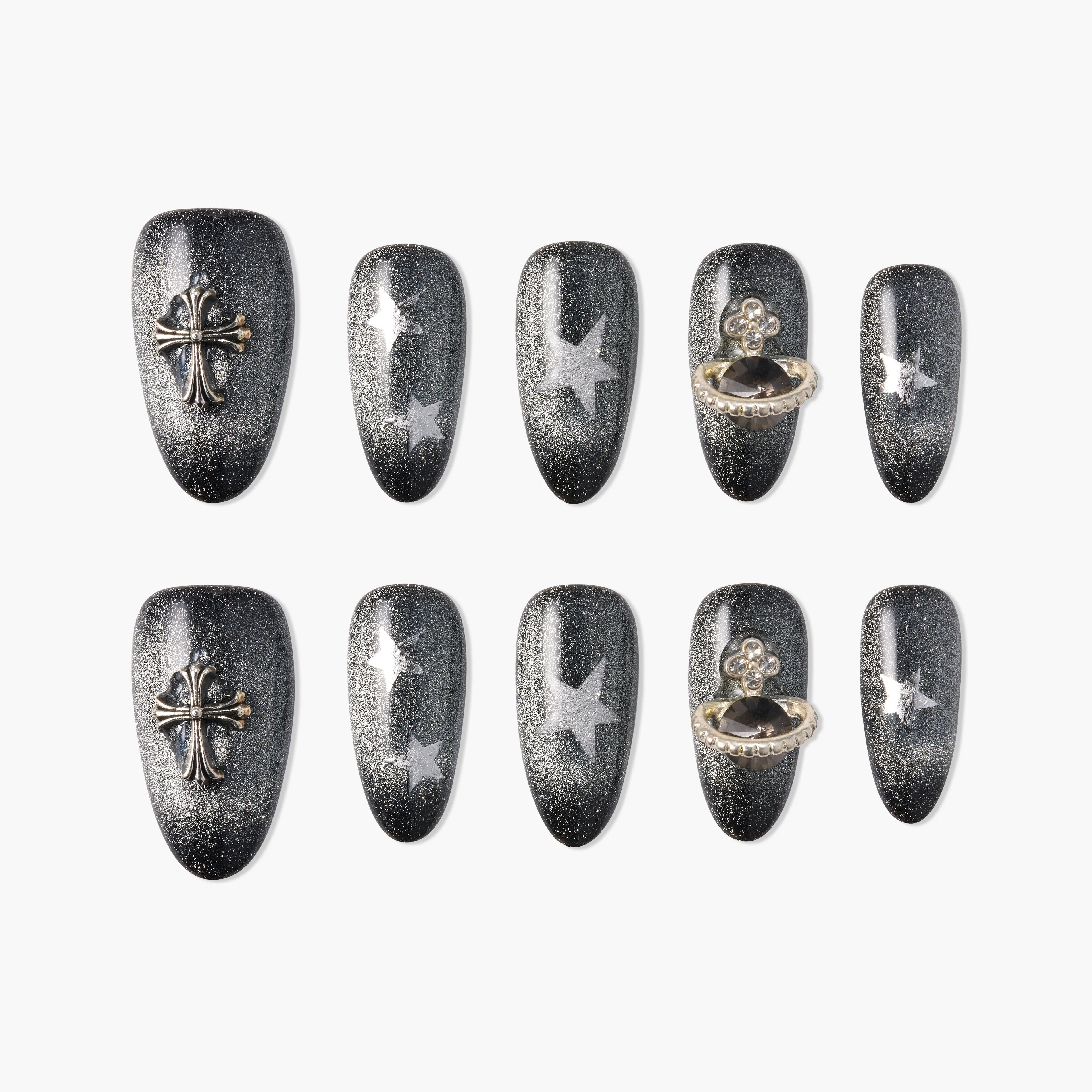 Handmade black press-on nails with silver glitter, stars, and metallic cross and gem accents