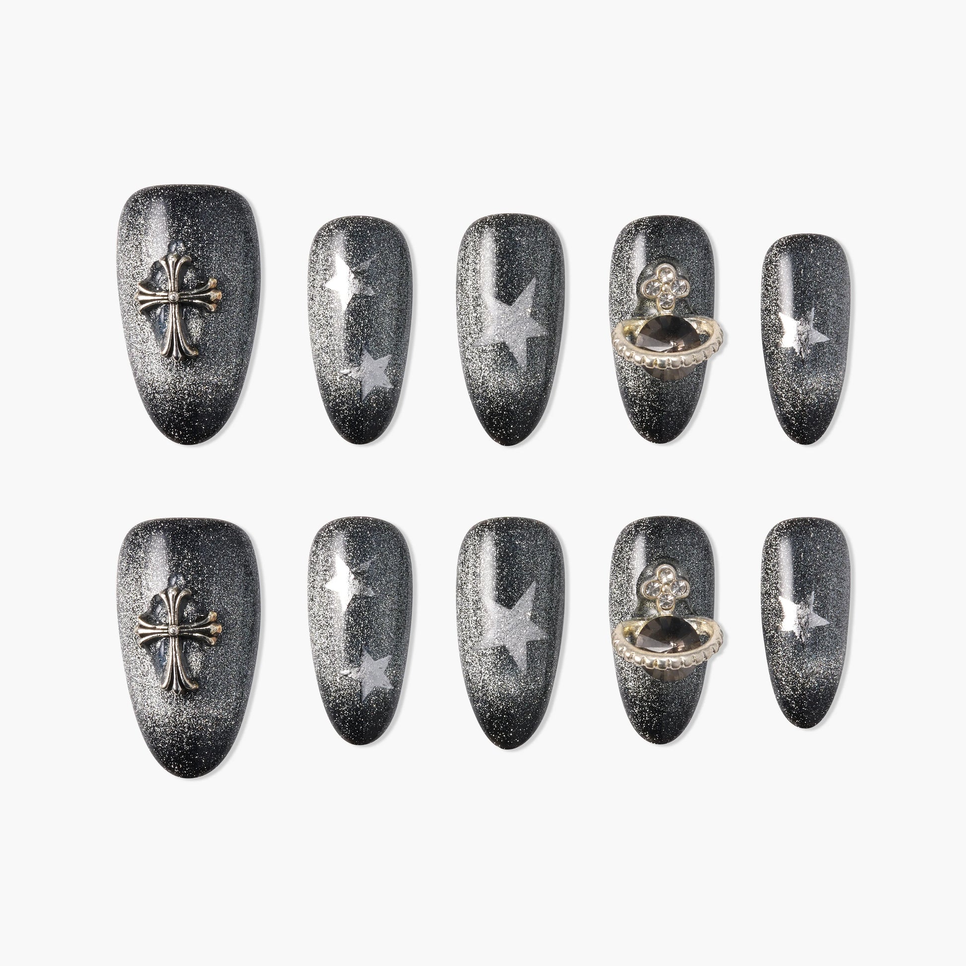 Handmade black press-on nails with silver glitter, stars, and metallic cross and gem accents