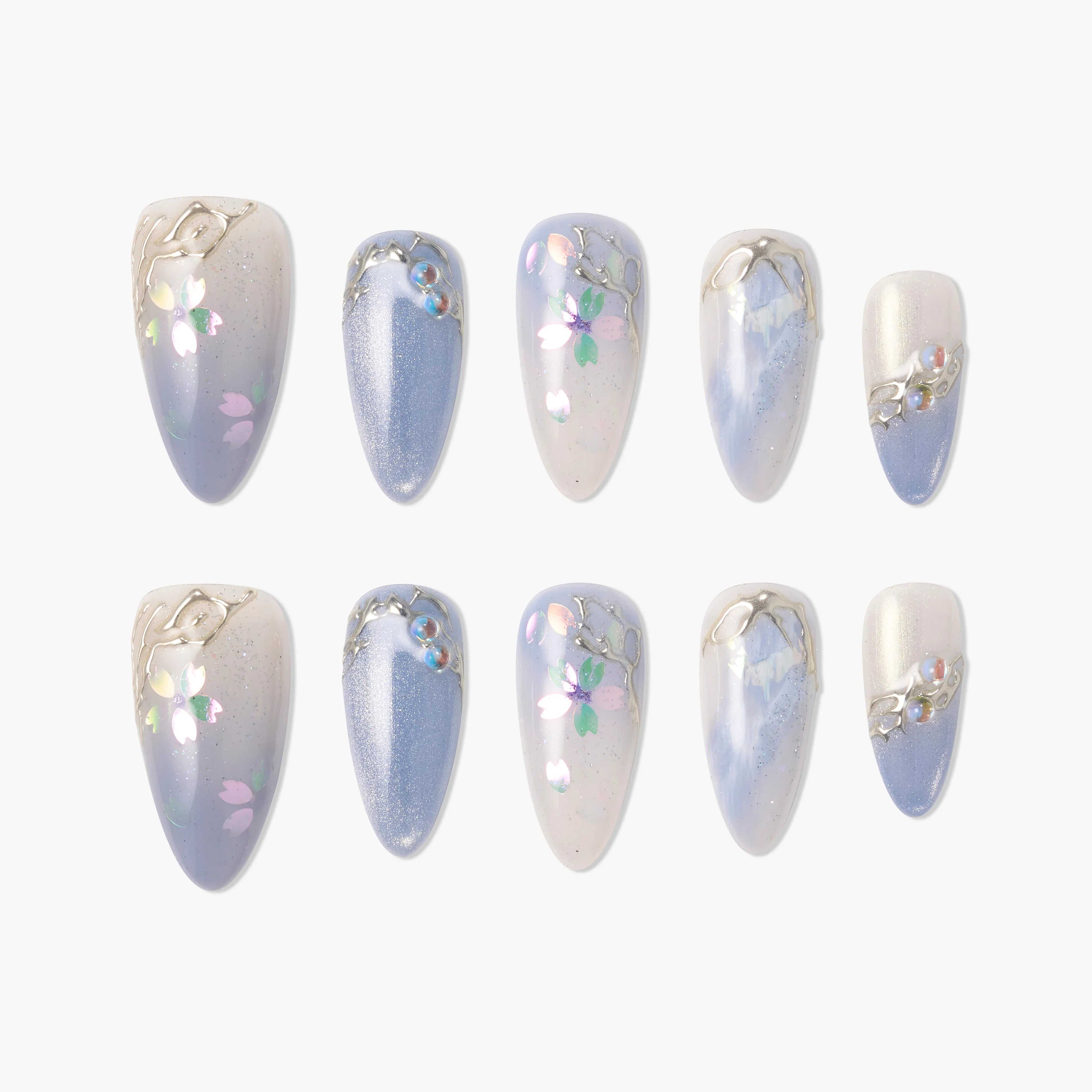 Handmade press-on nails with pastel blue, floral accents, pearl embellishments, and metallic details
