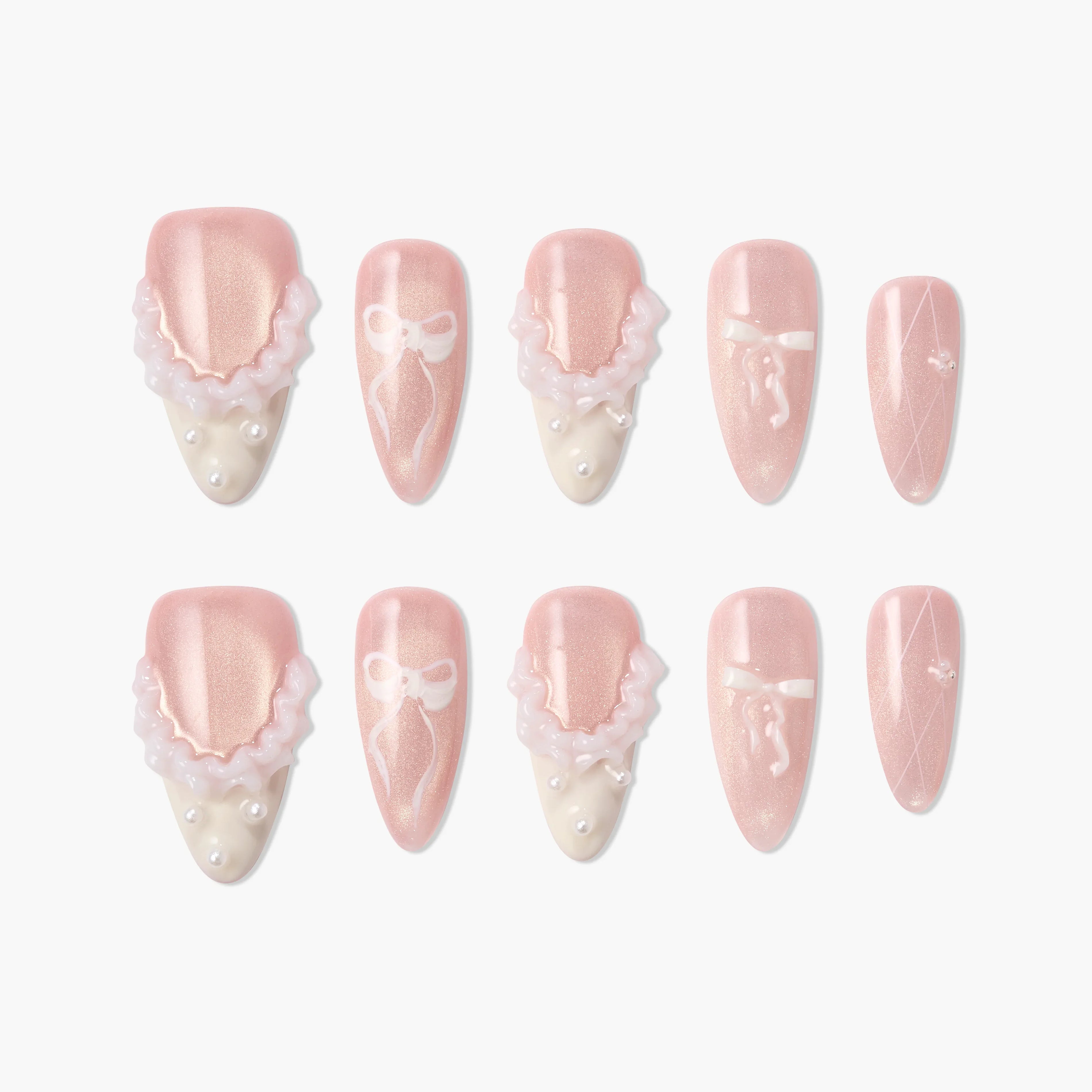 Pink and ivory press-on nails with 3D ruffle, pearl accents, and white bow nail art design.