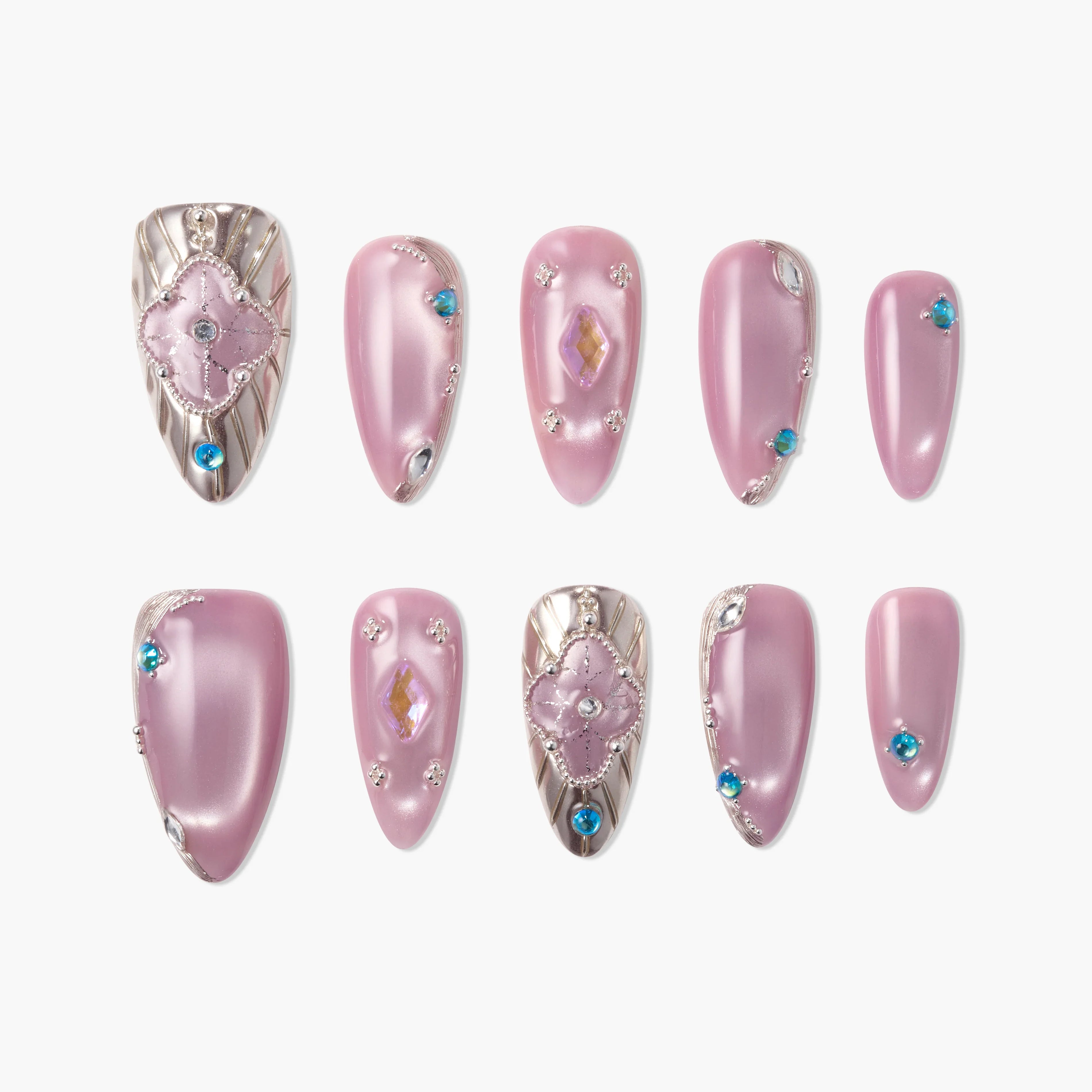 Pink press-on nails set with gemstone accents, rhinestones, and intricate metallic details