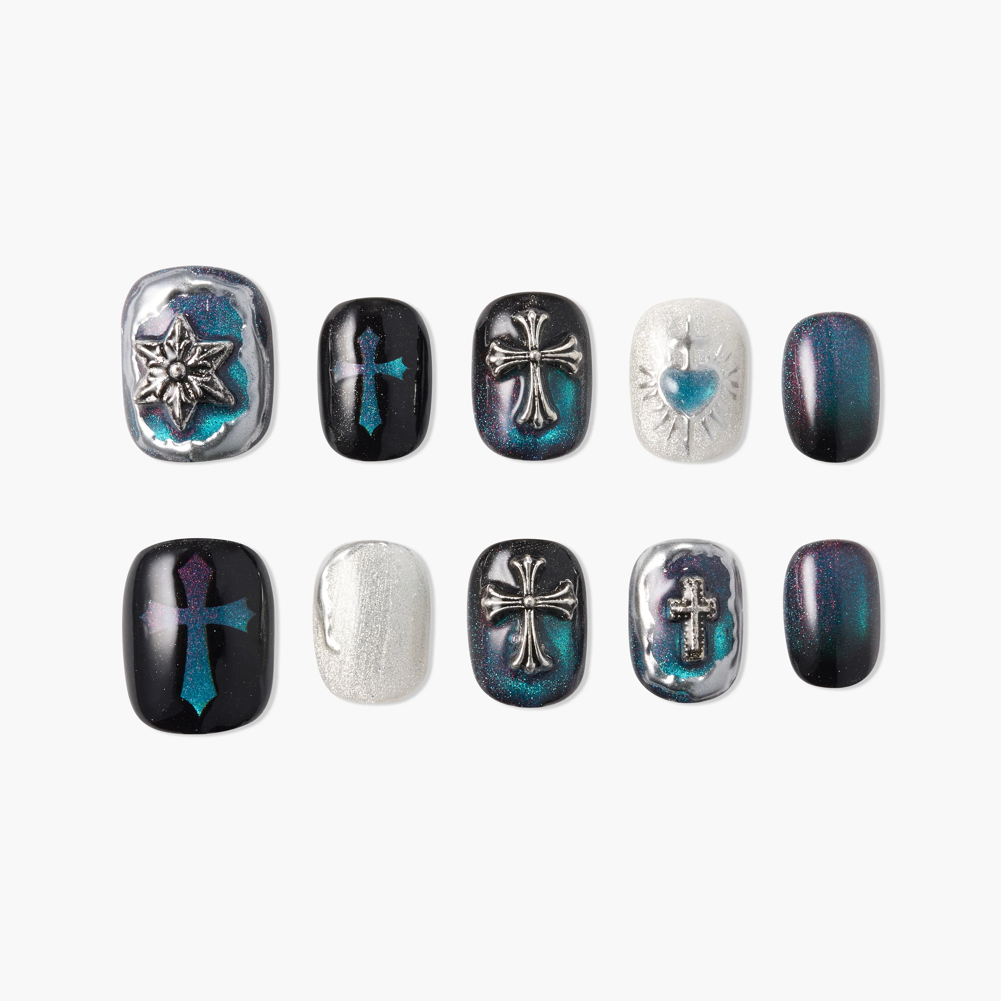 Handmade press-on nails with metallic cross and heart designs in black, teal, and silver tones.