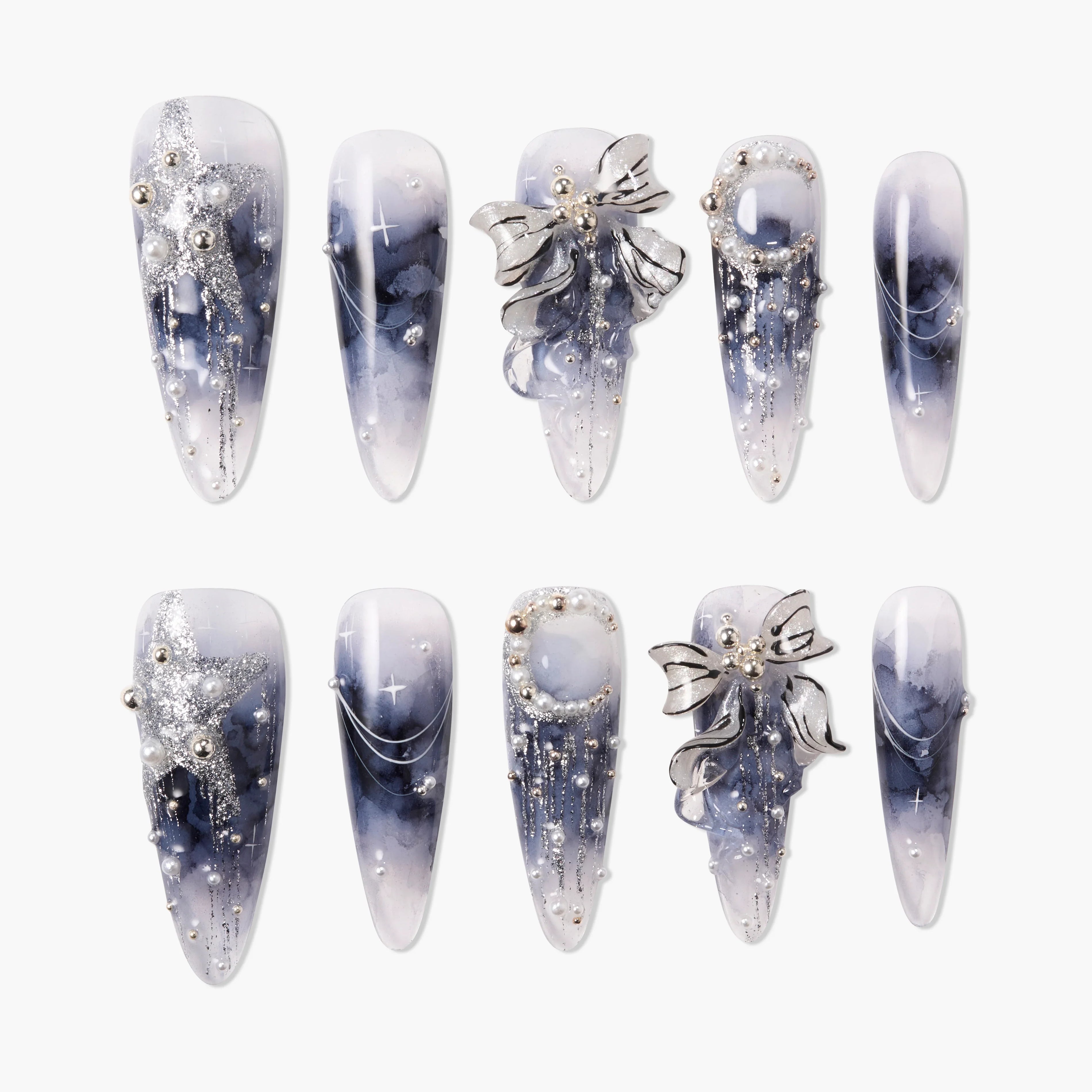 Handmade press-on nails with blue marble design, silver bows, pearls, and glitter accents