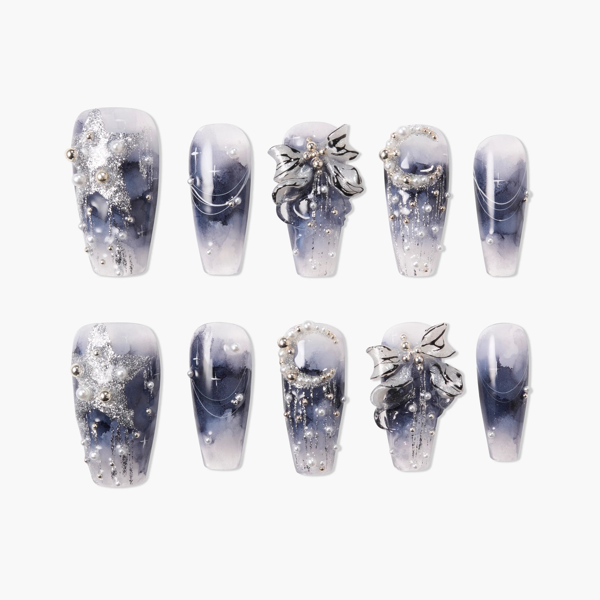 Handmade press-on nails with blue marble design, silver glitter, 3D bows, stars, and pearl accents
