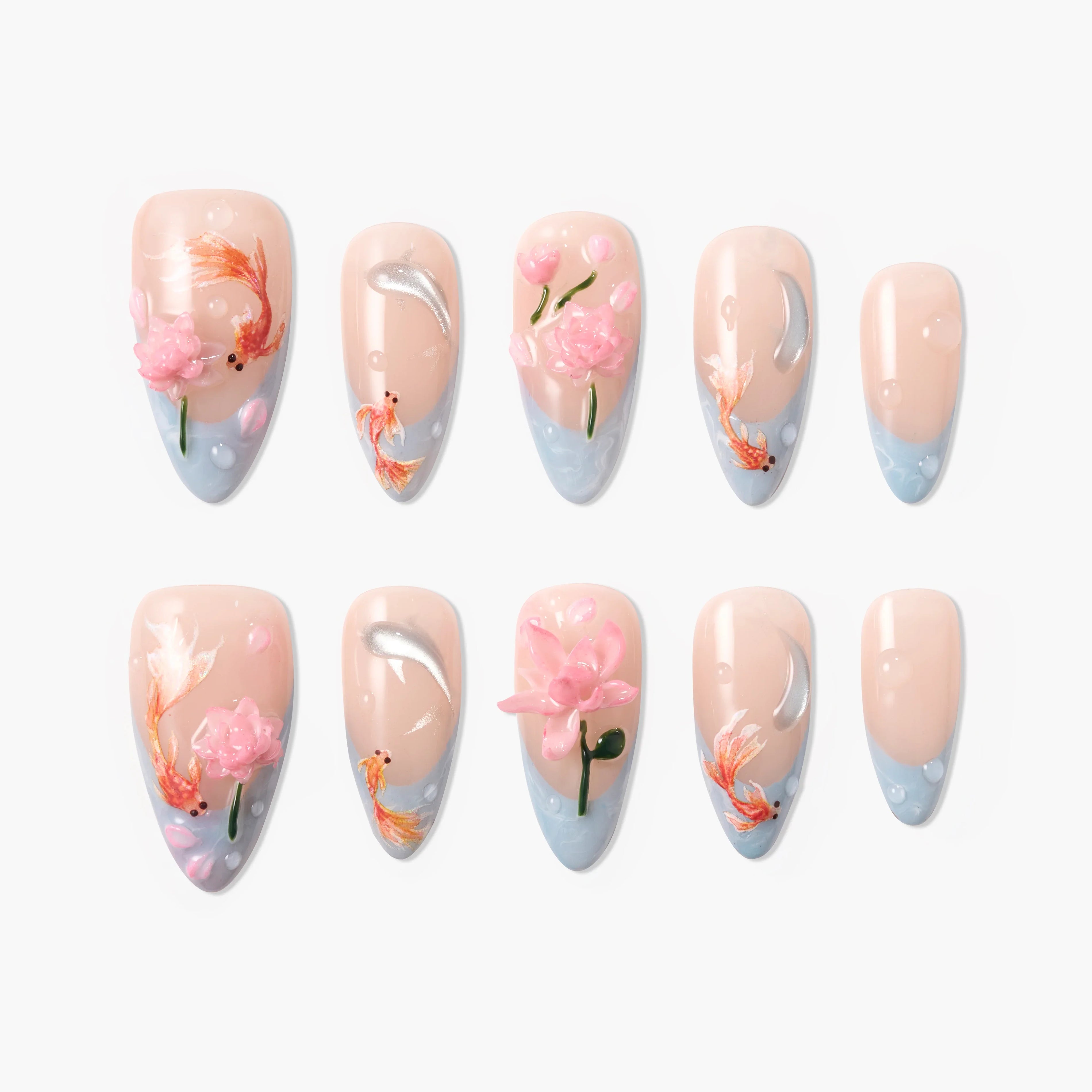 Handmade press-on nails with pink floral and koi fish designs on nude and blue background.