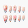 Handmade press-on nails with pink floral and koi fish designs on nude and blue background.