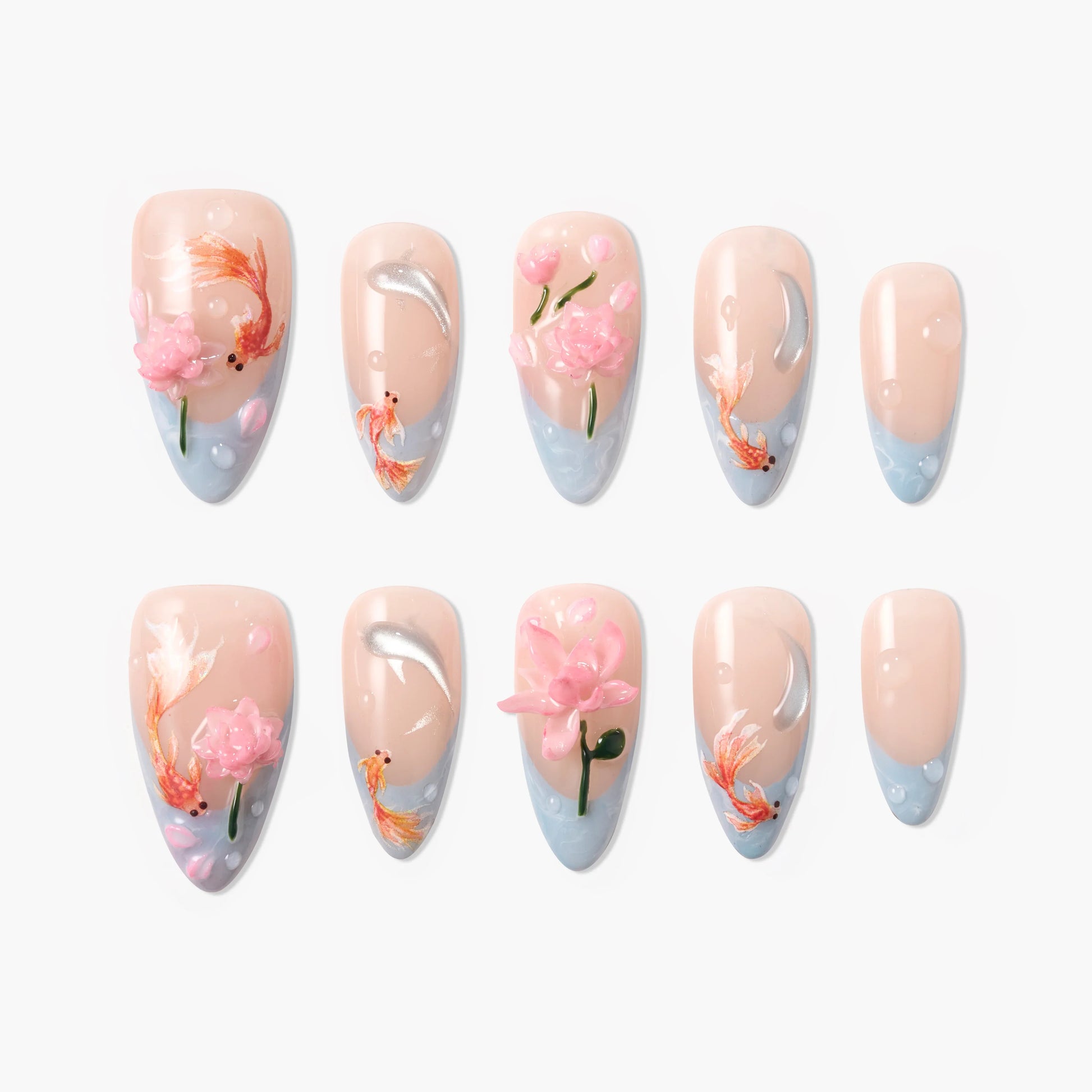 Handmade press-on nails with pink floral and koi fish designs on nude and blue background.