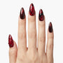 Hand with almond-shaped, red and black 3D rose floral press-on nails