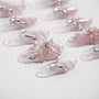 Handmade pink ombre press-on nails with 3D floral accents and crystal rhinestone details
