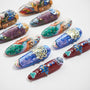 Handmade press-on nails with intricate 3D art, peacock, floral, and gemstone designs