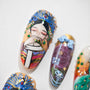 Hand-painted press-on nails with intricate Asian-inspired art and floral designs