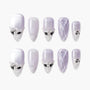 Lilac almond press-on nails with crystal accents, 3D quilted design, and glitter tips.